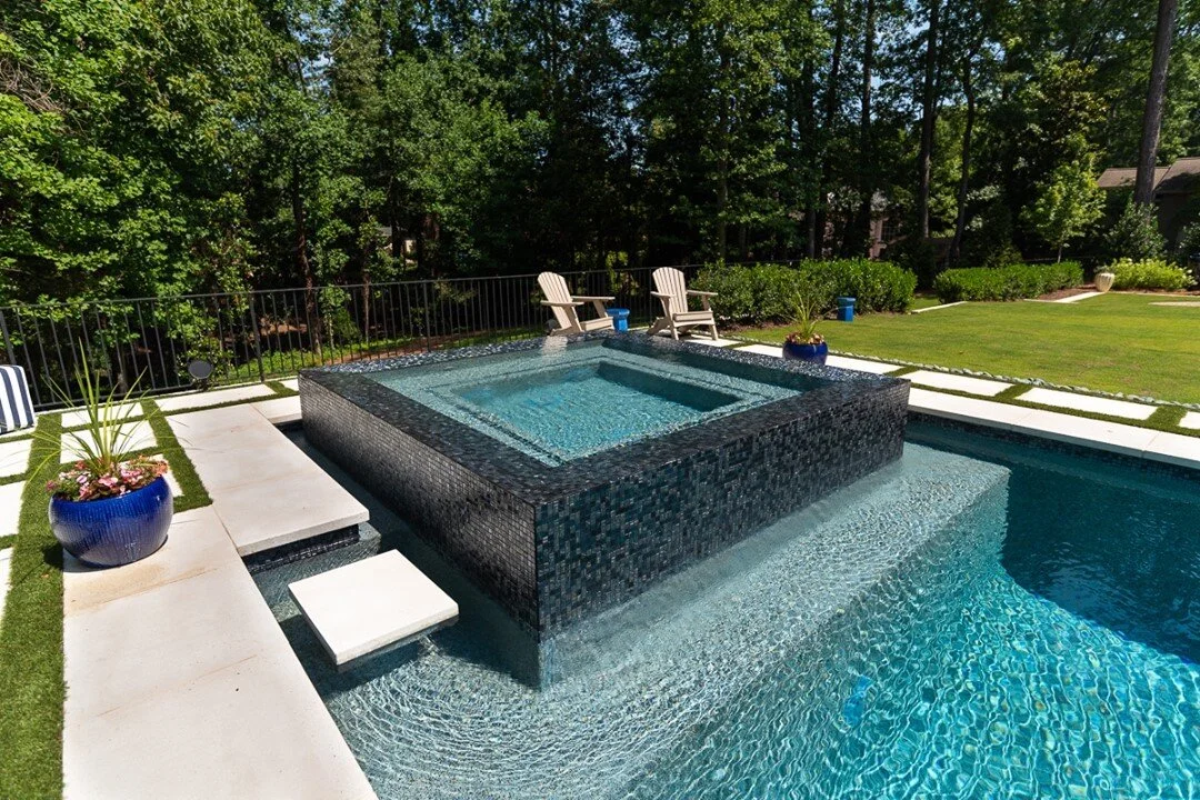 We can't get enough of this dark tile look! It's so sharp-looking when you contrast it with the bright tiles around it!