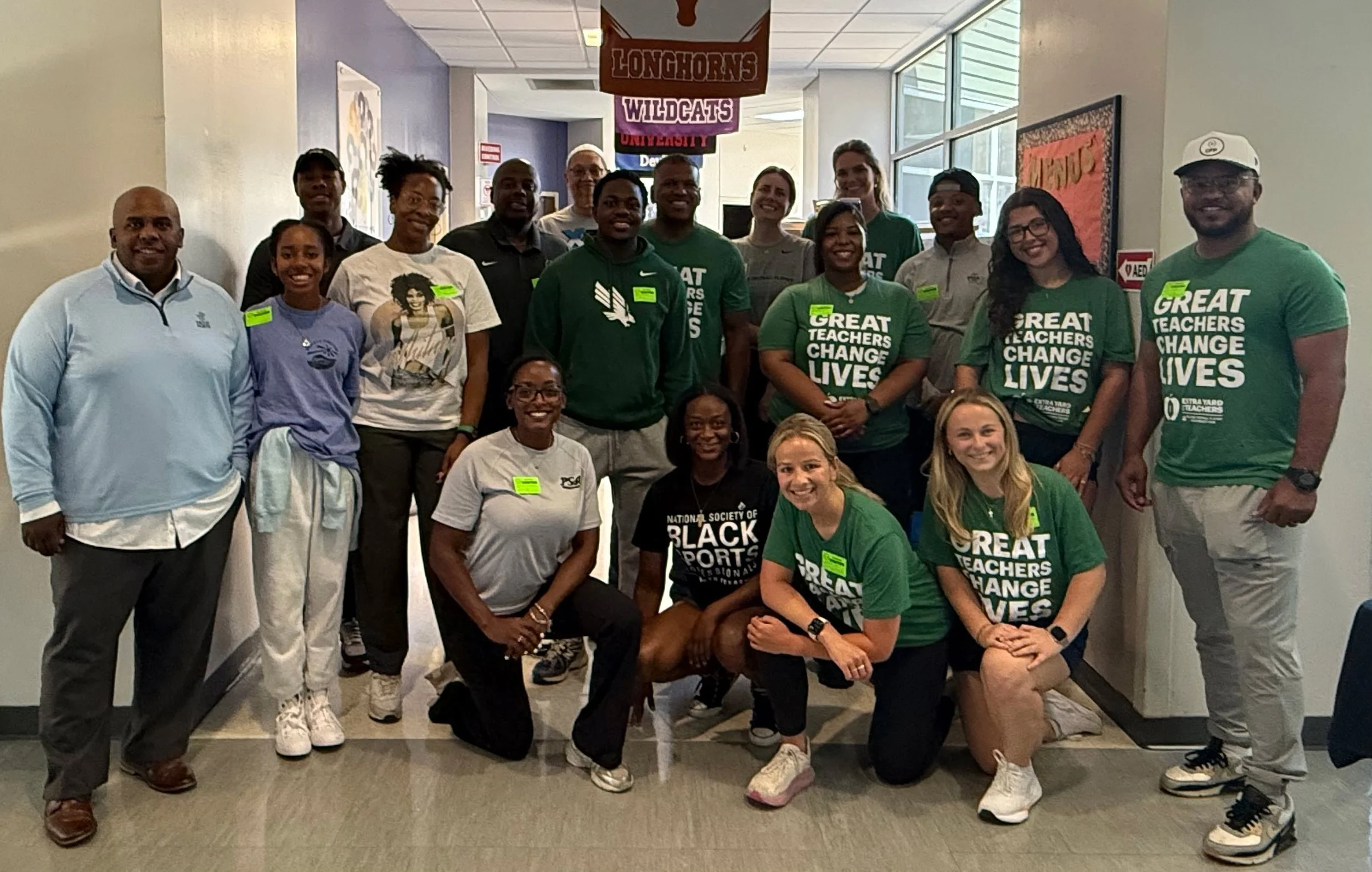 Many hands made lighter work at Uplift Summit Preparatory!

Twenty volunteers from the College Football Playoff Foundation and Black Sports Professionals North Texas spent Friday helping Uplift Summit teachers prepare for a strong start to the school