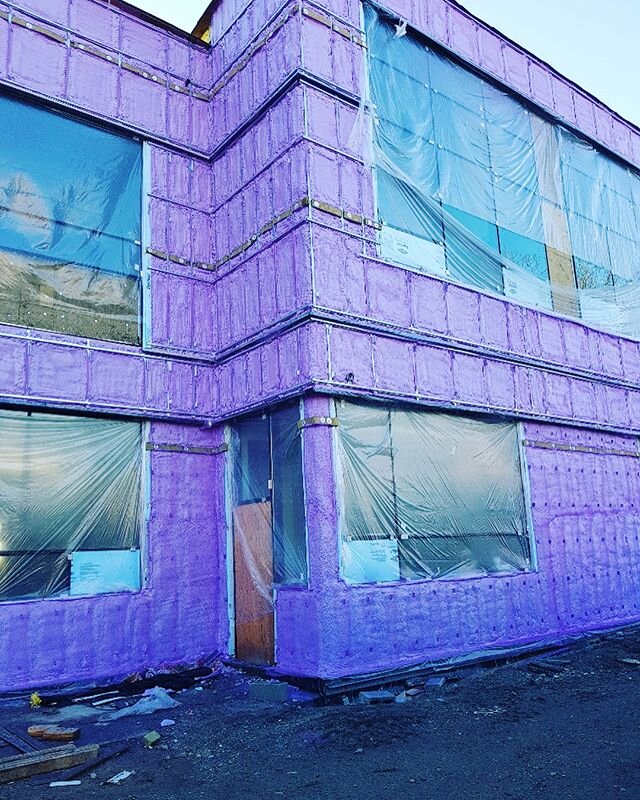 Walltite Eco on the outside of a school behind brick / cladding.  #rainscreen #airbarrier #sprayfoam #walltite #greenbuilding #ecofriendly #insulation #construction #vancouver