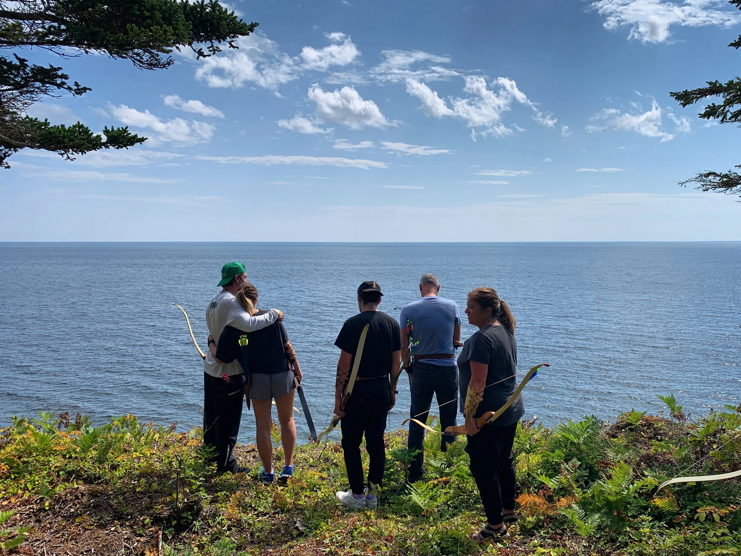 Groups shooting by the sea