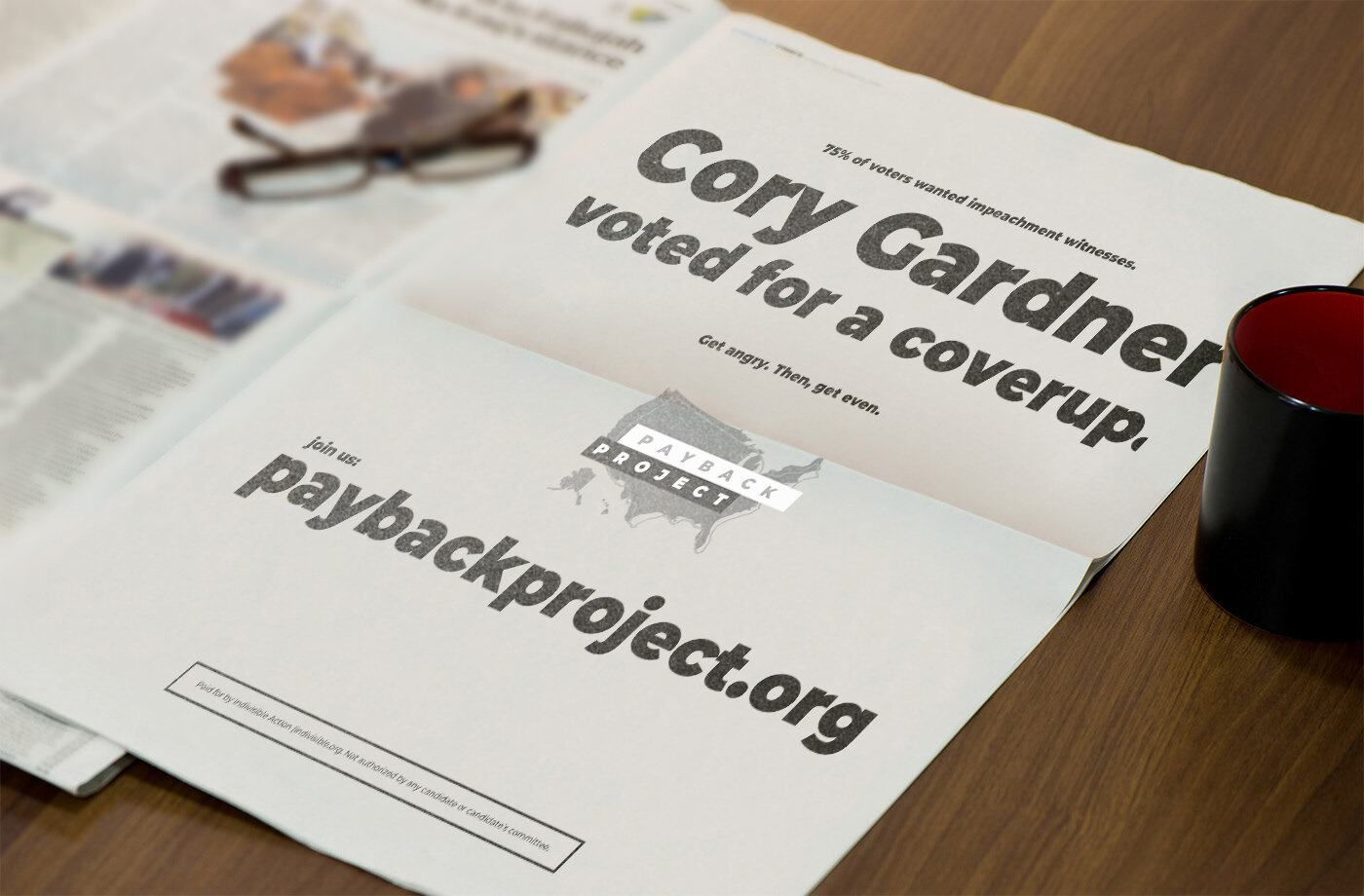 A picture of a newspaper with full page text, 75% of voters wanted impeachment witnesses. Cory Gardner voted for a coverup. Get angry. Then, get even. Join us: payback project.org