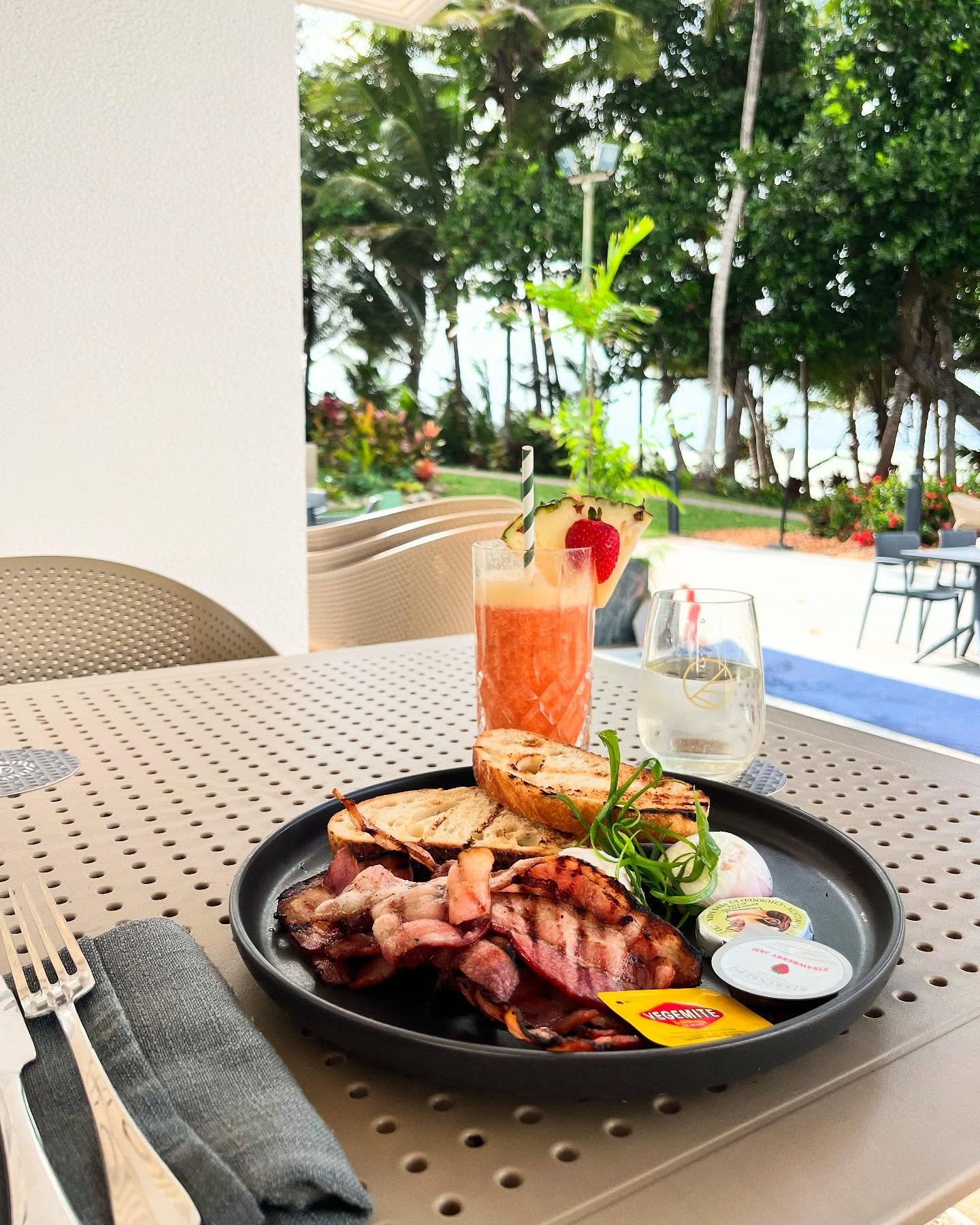 | a simple but delicious breakfast in the tropics, with the crashing waves of Four Mile Beach as the soundtrack. ✨🍳 @lagoonhouseportdouglas @sheratongrandportdouglas 

#OneBiteAtATime #LagoonHouseRestaurant #PortDouglas