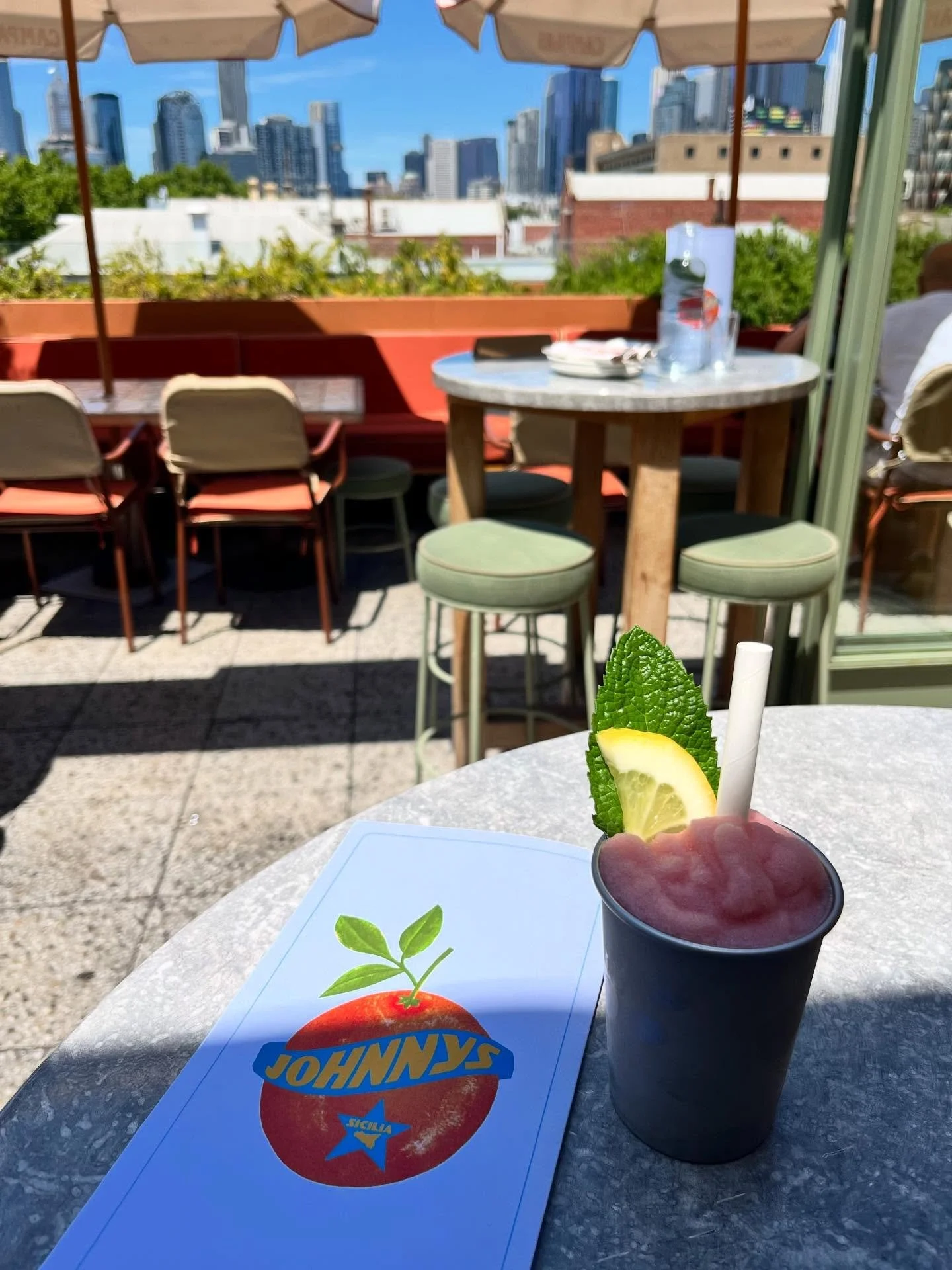 | a walk down Lygon Street led me to @JohnnysGreenRoom and it didn&rsquo;t disappoint - killer city views, beautiful bar and terrace in the sunshine and a delicious alcoholic slushie, making it the perfect summertime spot. ✨

#OneBiteAtATime #Johnnys