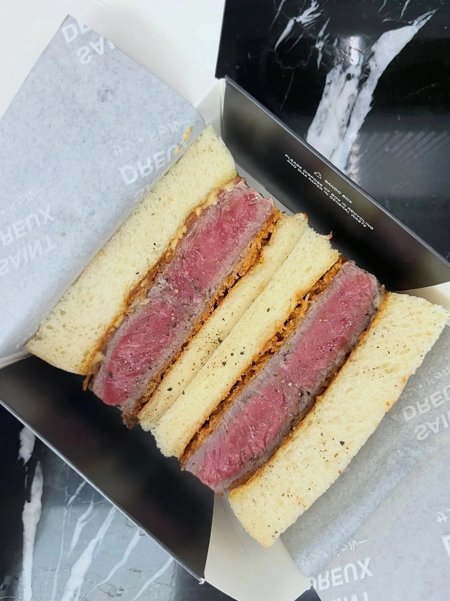 | the best sandwich I did ever have, especially from a shopping centre. Discovered this seriously delicious Japanese wagyu sando at @Saint.Dreux hidden below ground at Melbourne&rsquo;s @EmporiumMelbourne - the pork, prawn and chicken sando&rsquo;s w