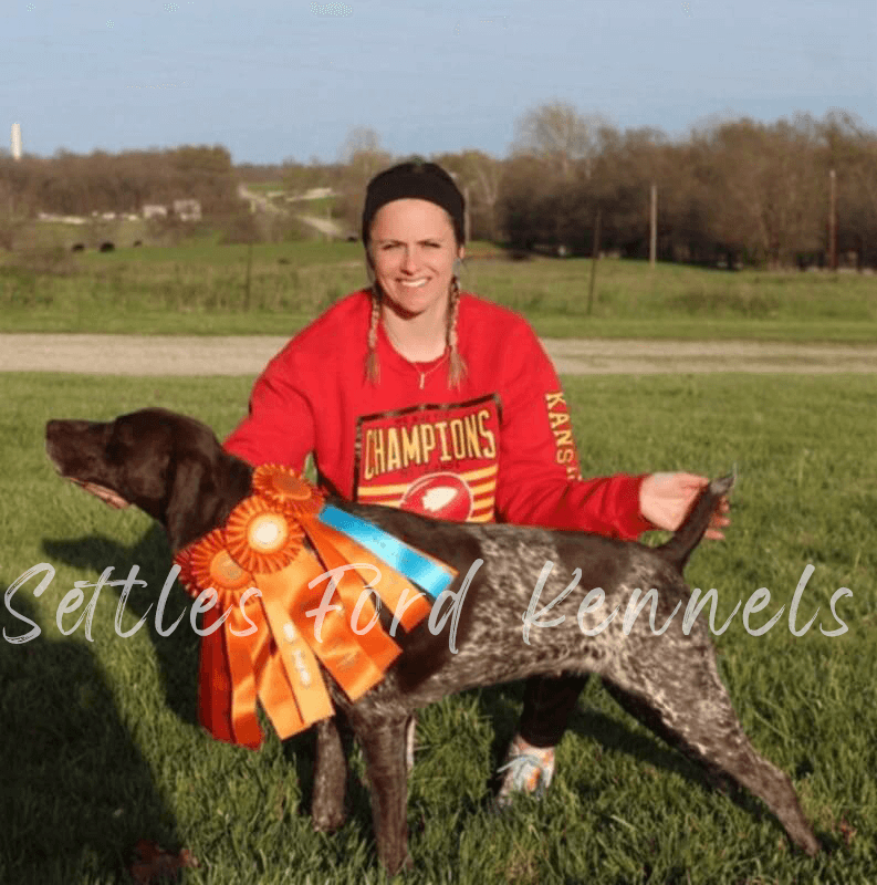 Champion German Shorthaired Pointer Dam Raelynn SFSharp Shootn Guns N Roses with owner Chantal Donnely