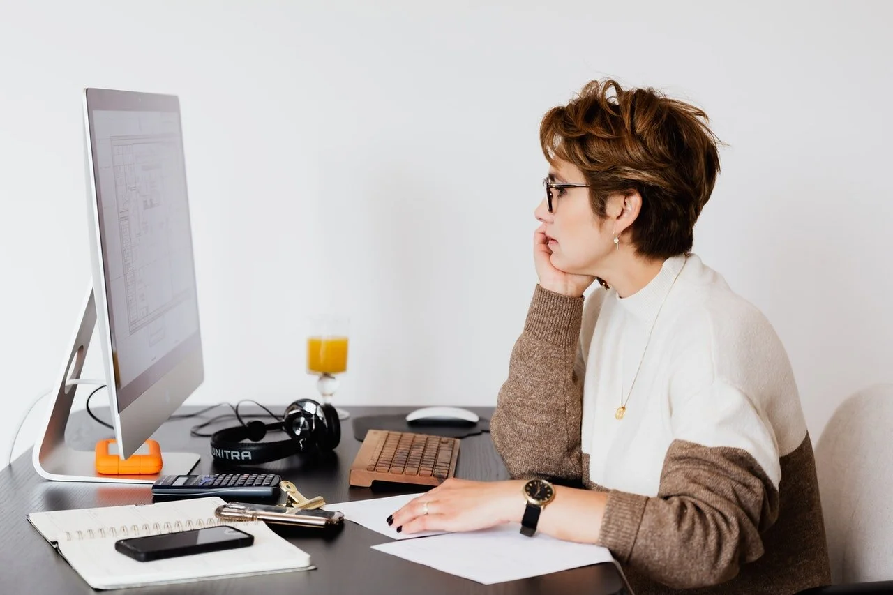 architect looking at plans on computer.jpg