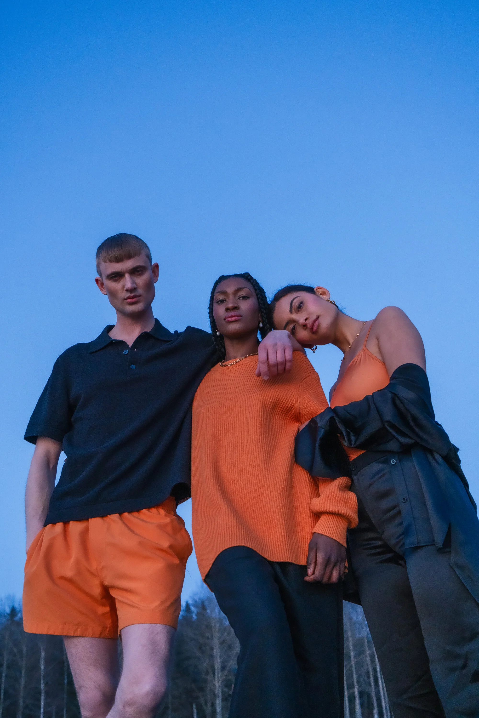 [L - R] Leo wears: Top - ARKET | Shorts - Samsøe Samsøe    Mariama wears: Jumper - Samsøe Samsøe | Jeans - HOPE Stockholm    Saga wears: Swimsuit - Samsøe Samsøe | Shirt and Trousers - Viktoria Chan | Earrings - Edblad