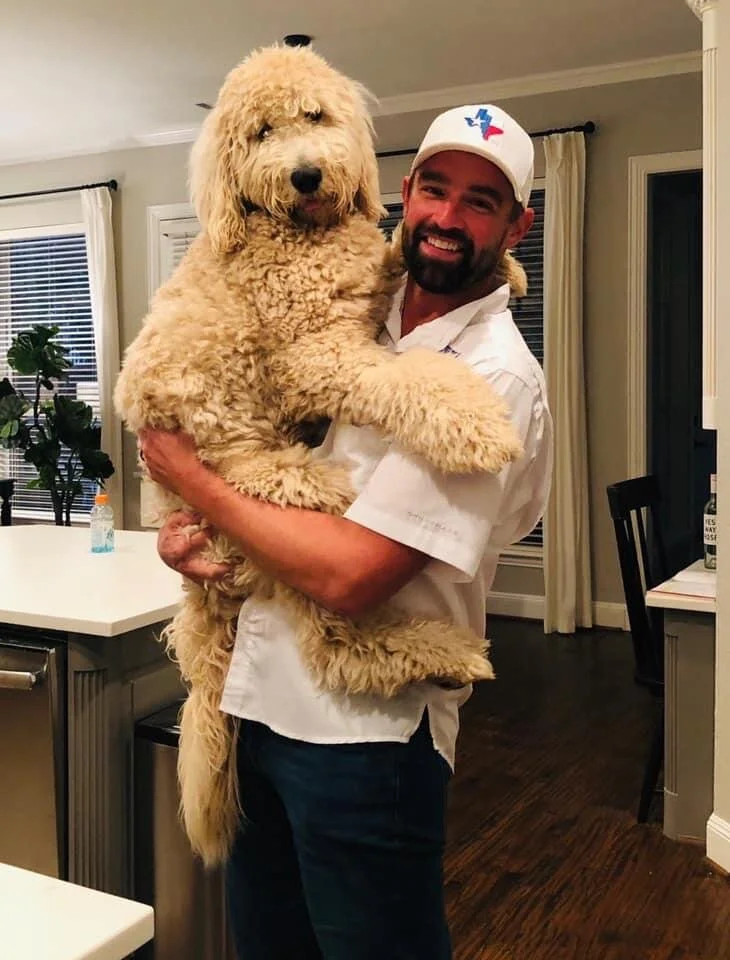 Pictured: (L) a dog, [R] a slave