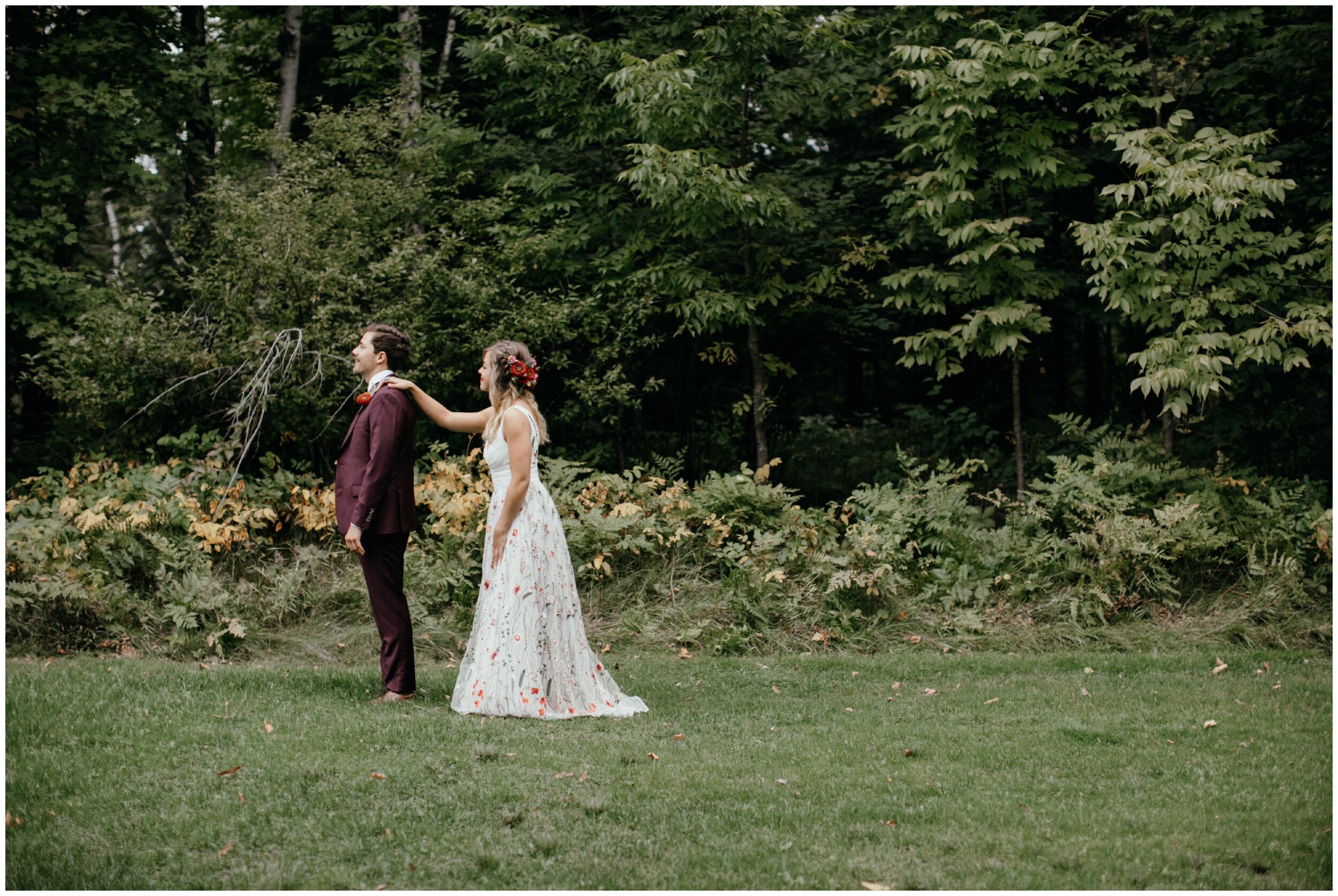 Bride and groom first look at summer camp wedding in Eveleth, Minnesota