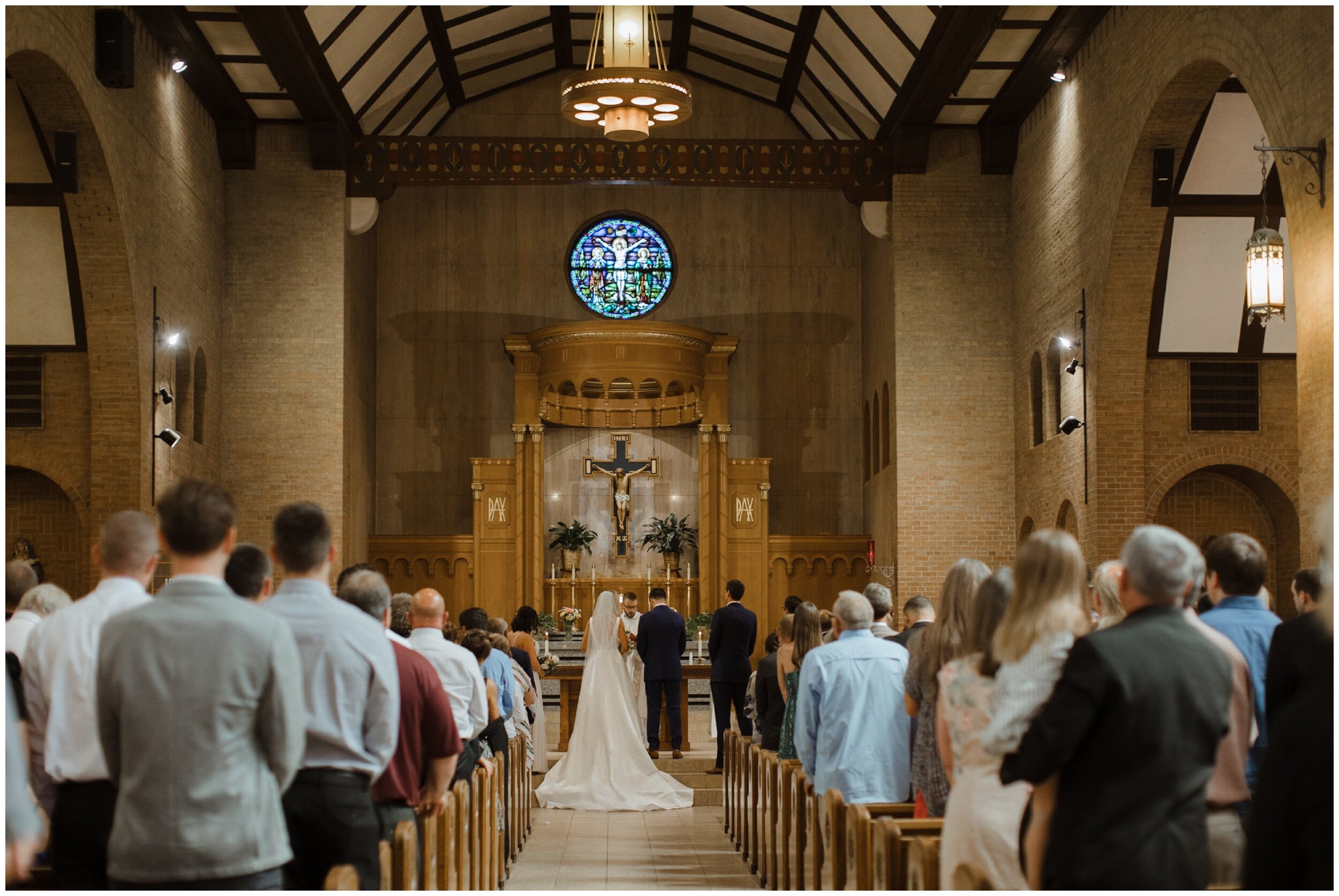 Catholic wedding ceremony in Brainerd, Minnesota photographed by Britt DeZeeuw