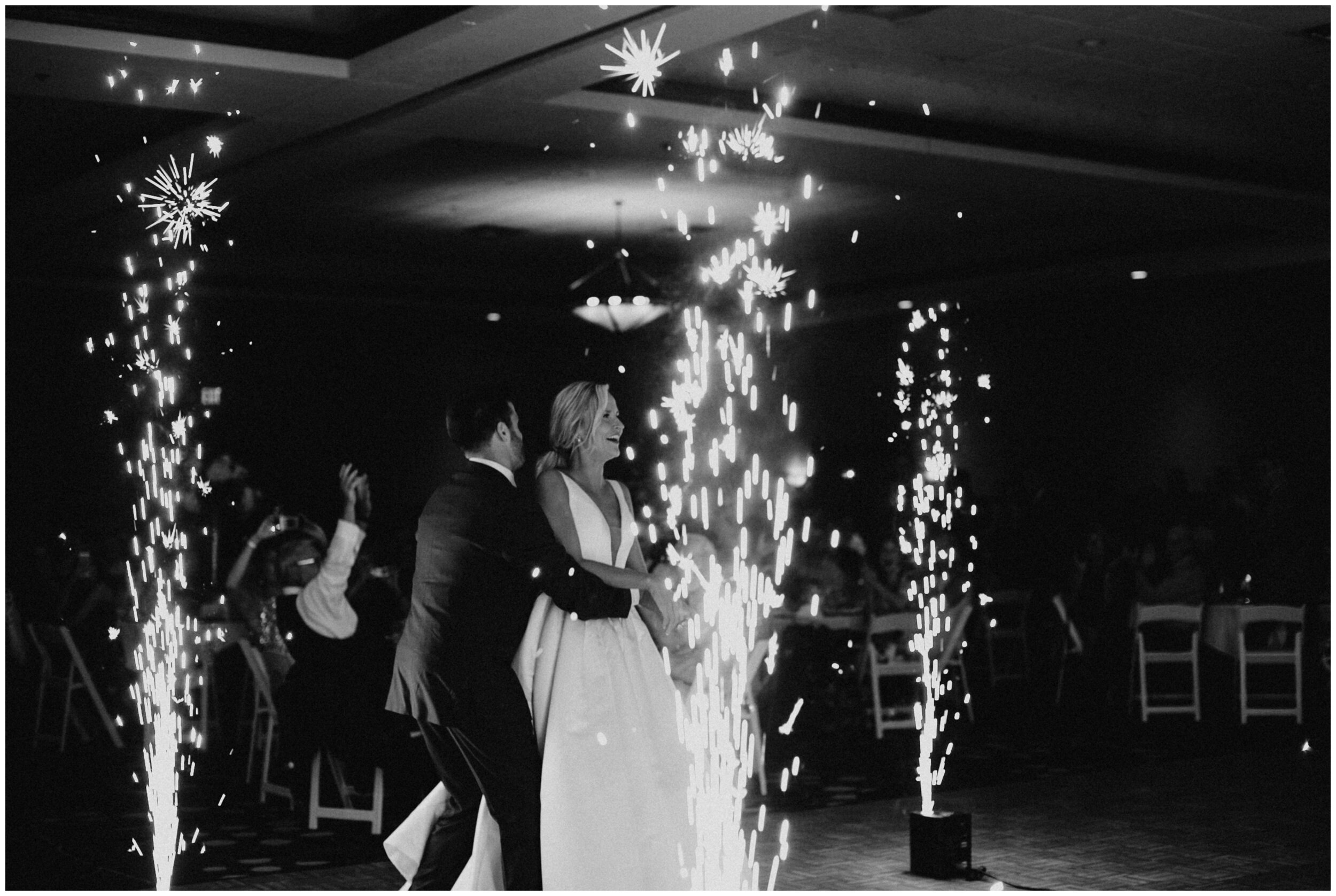 Bride and groom surprise sparkler wedding reception entrance at Grand View Lodge in Nisswa, Minnesota