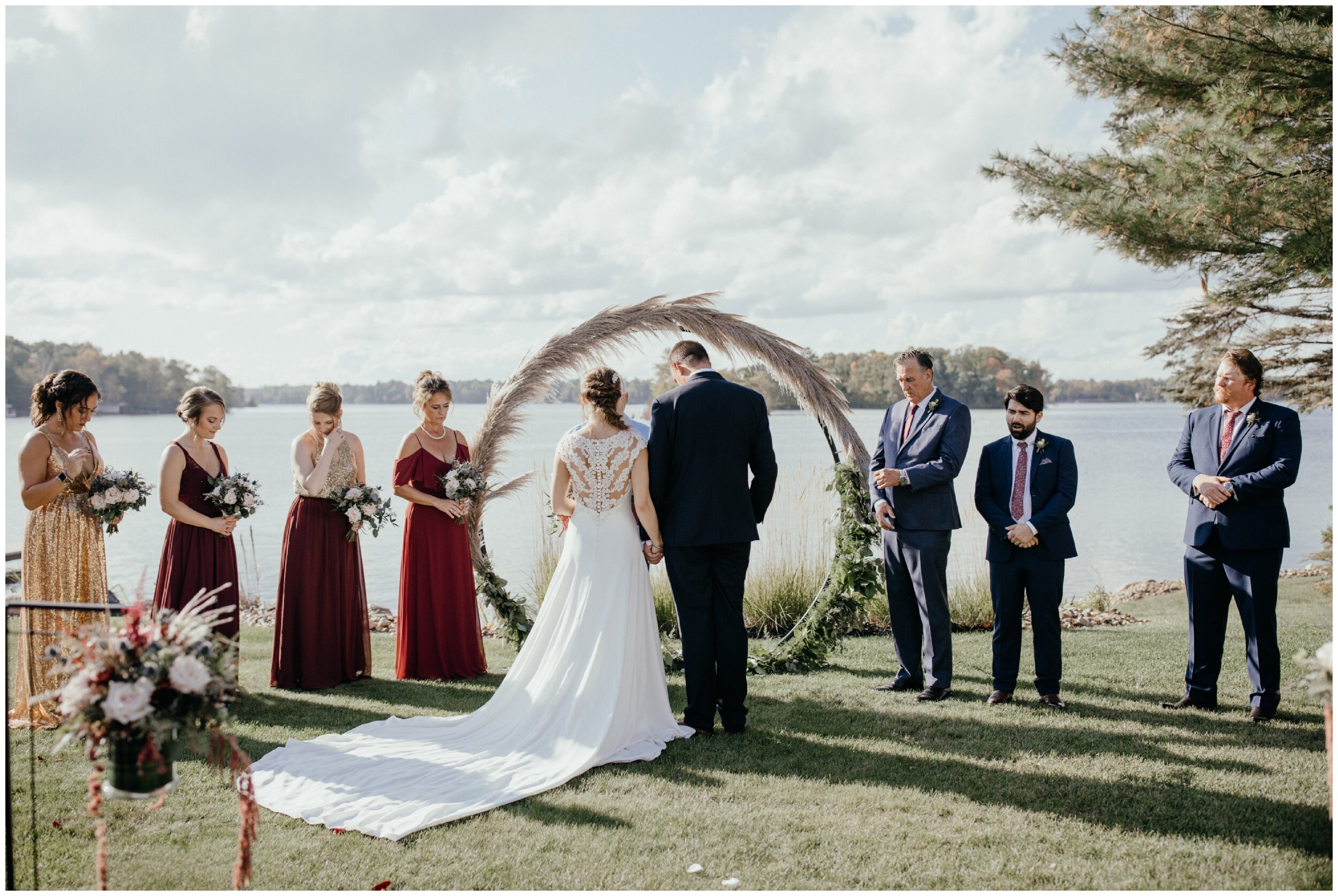 Lakeside summer wedding ceremony in Crosslake, Minnesota