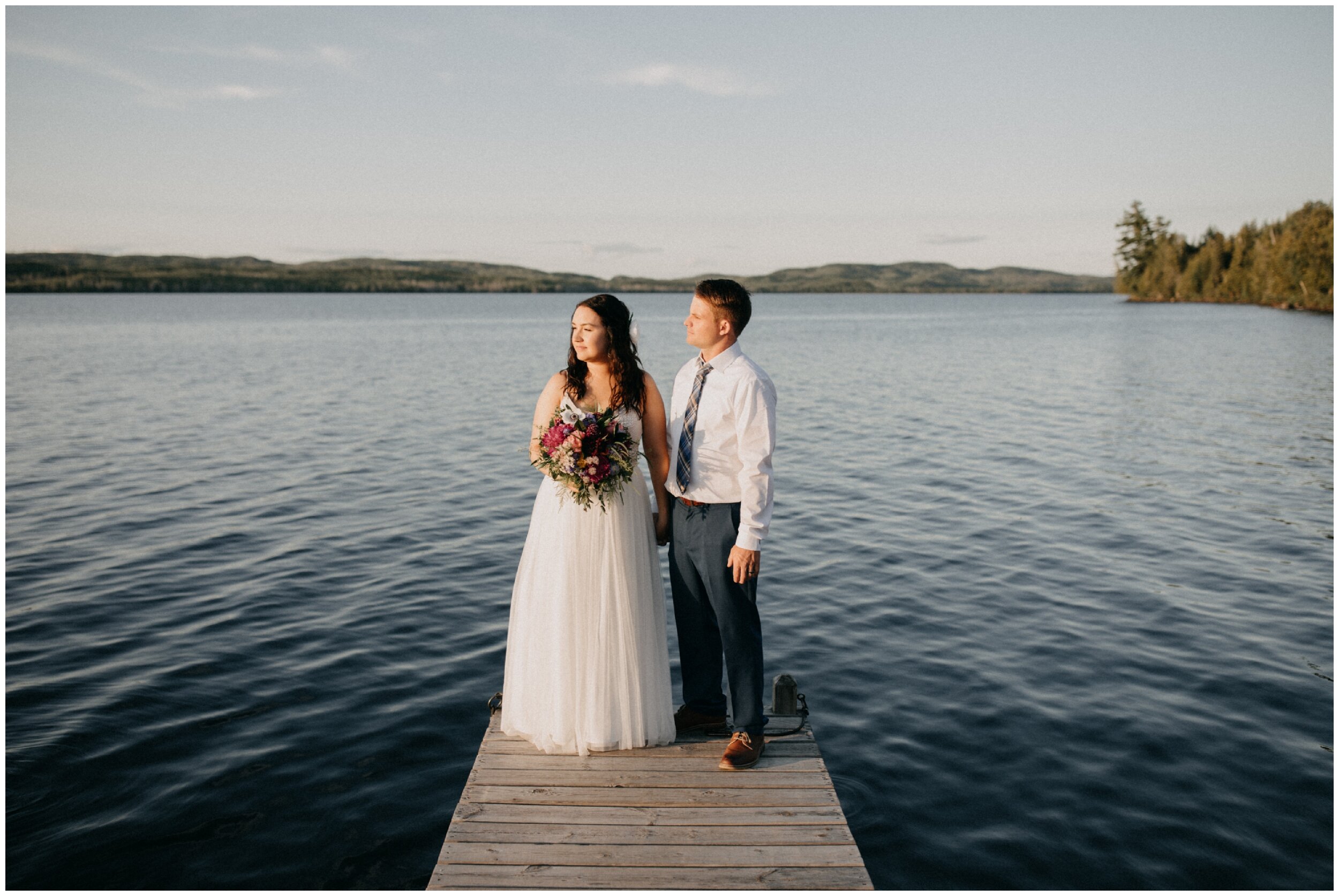 Romantic Minnesota summer elopement on Gunflint Lake during sunset