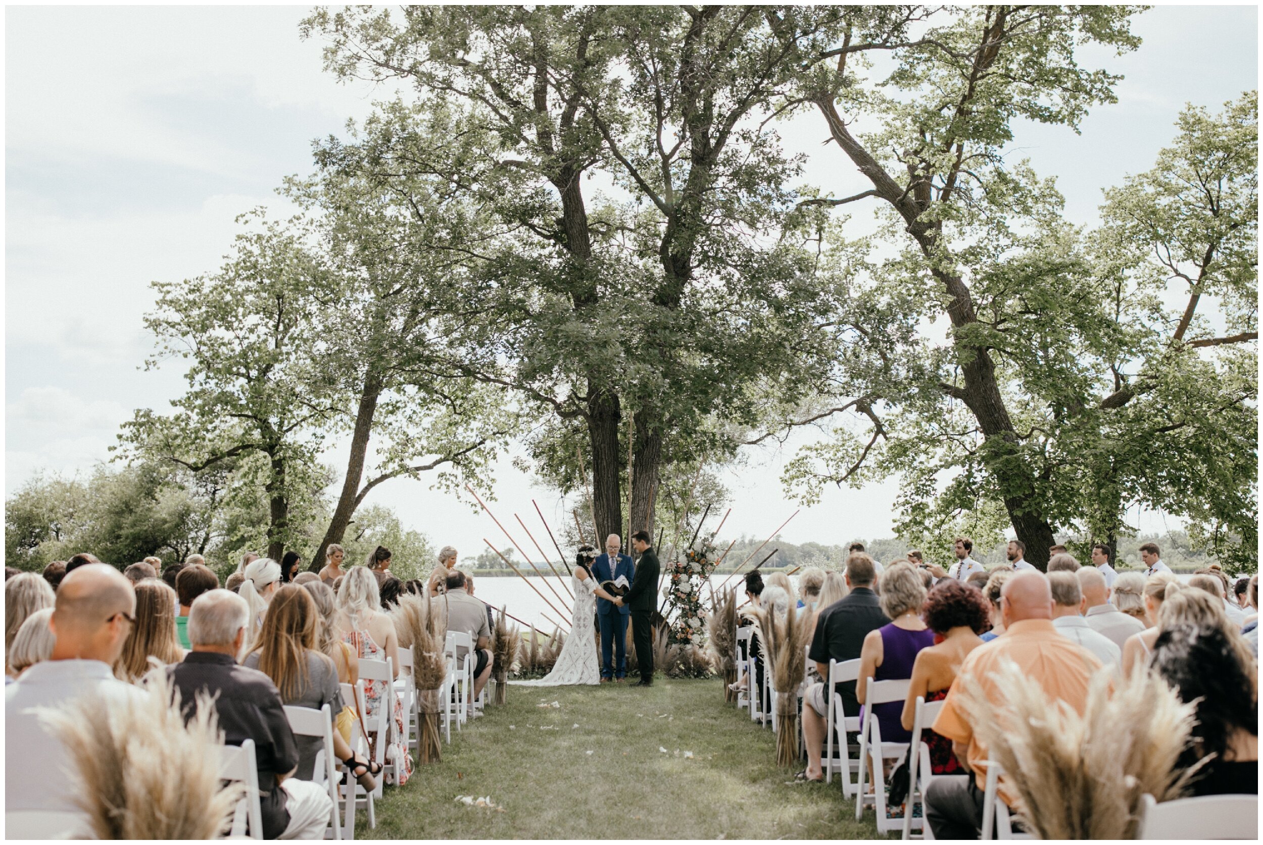 Boho inspired Minnesota backyard summer wedding on the lake 