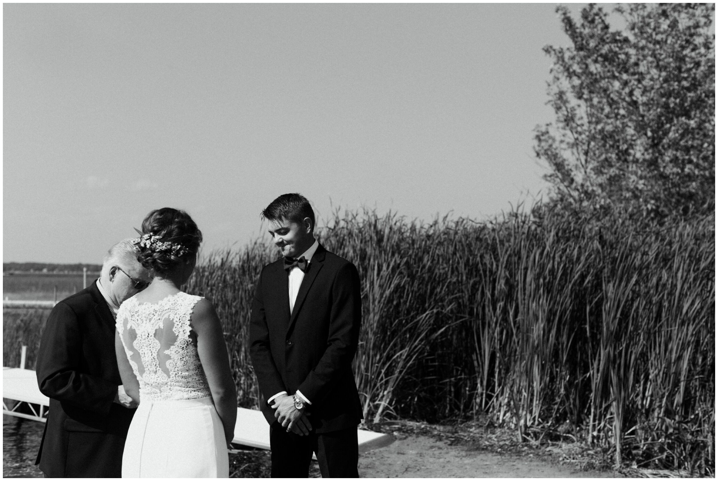 Sandy beach wedding ceremony on Lake Edward