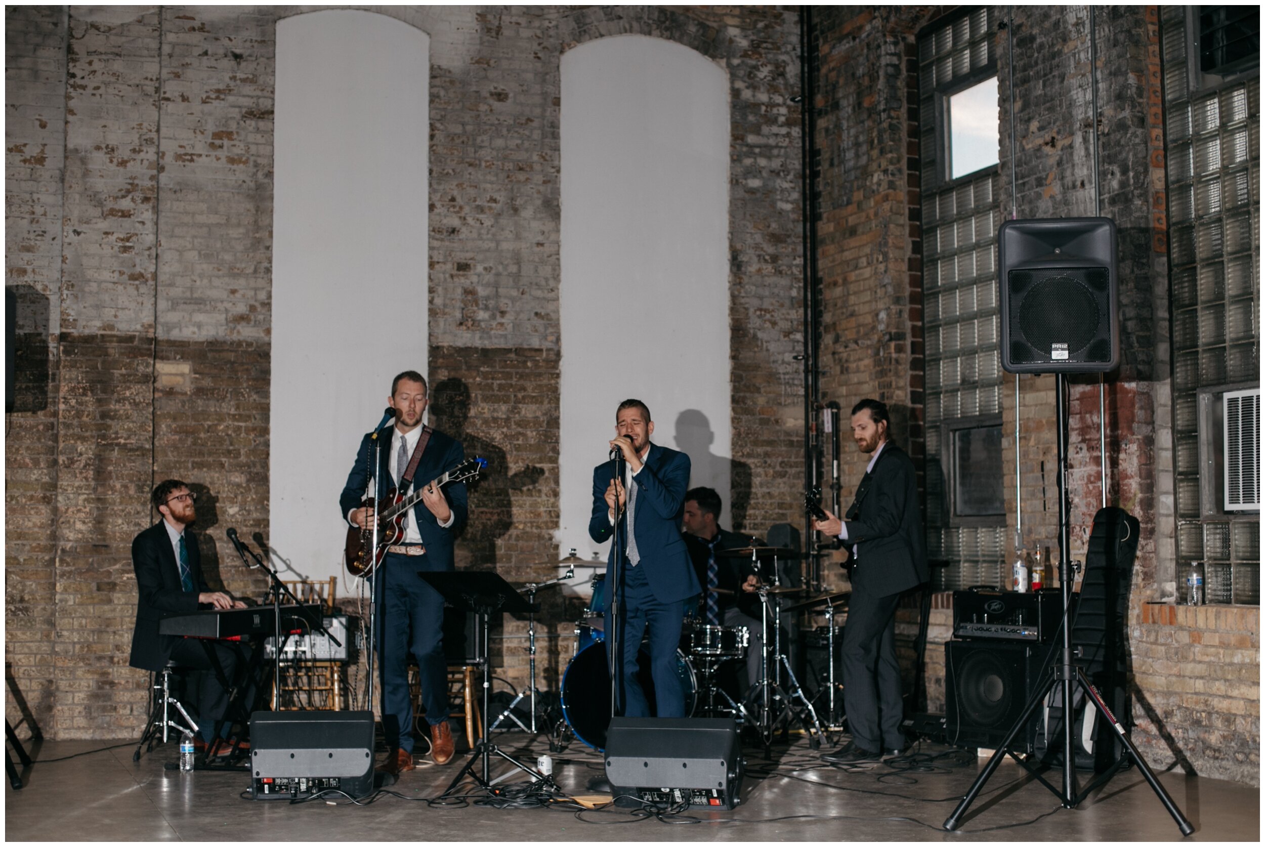 Wedding reception live band in industrial warehouse