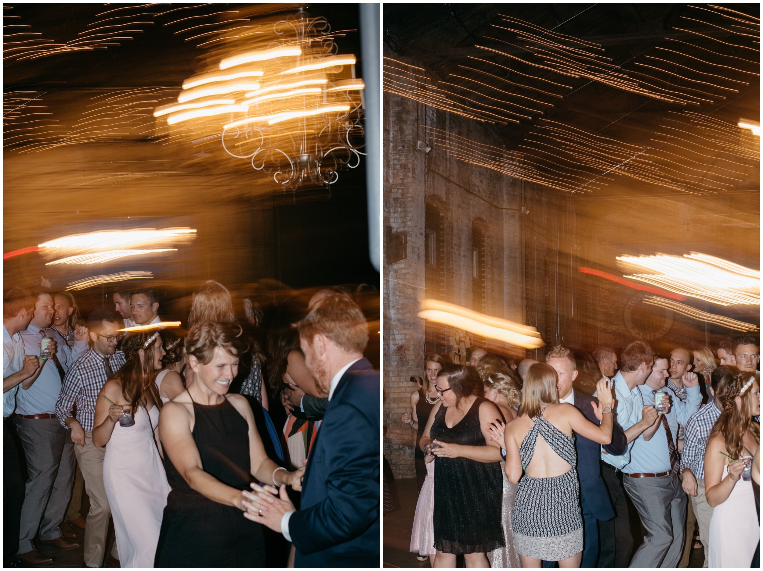 Wedding guests dancing in industrial warehouse wedding