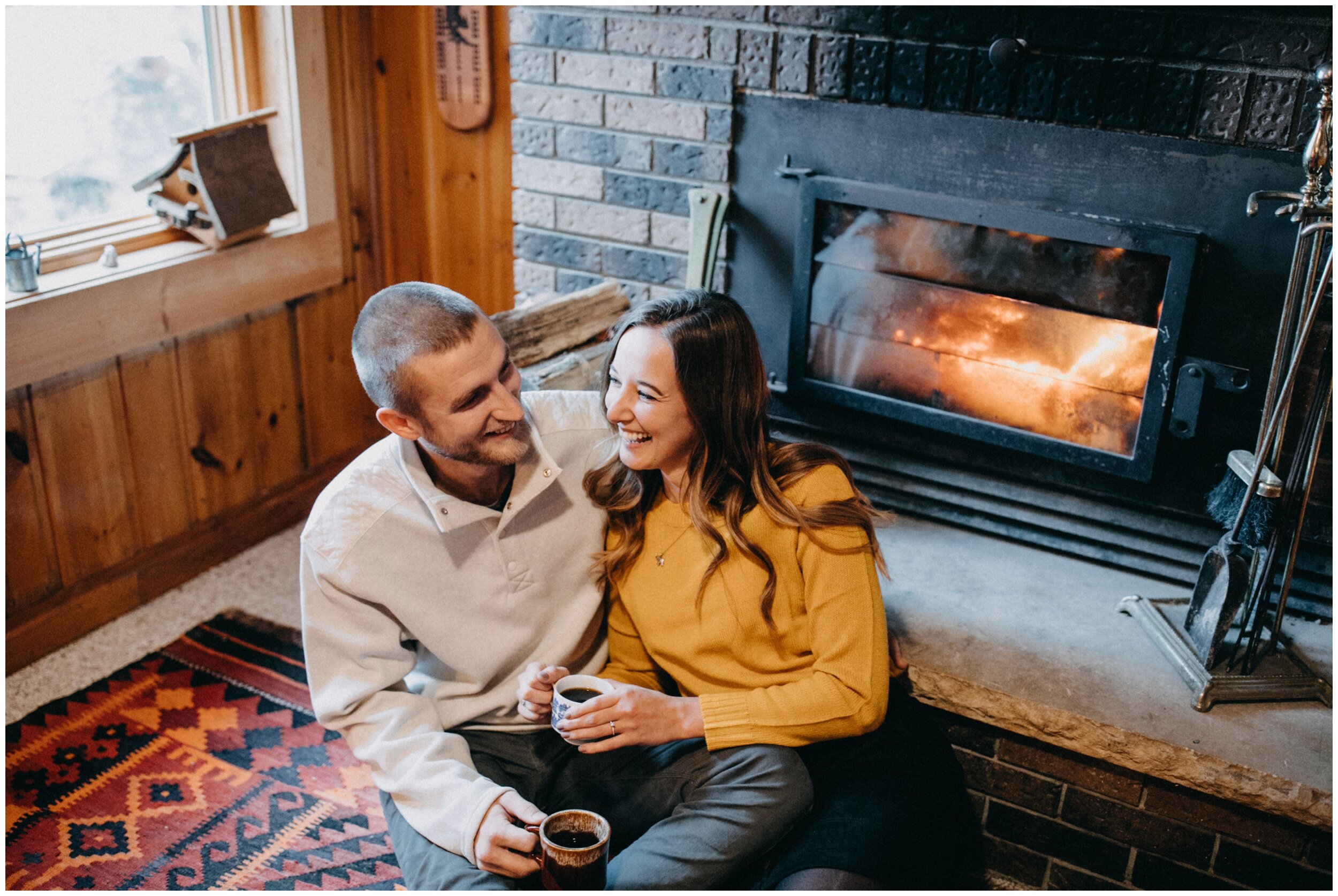 Cozy fall engagement session by the fireplace