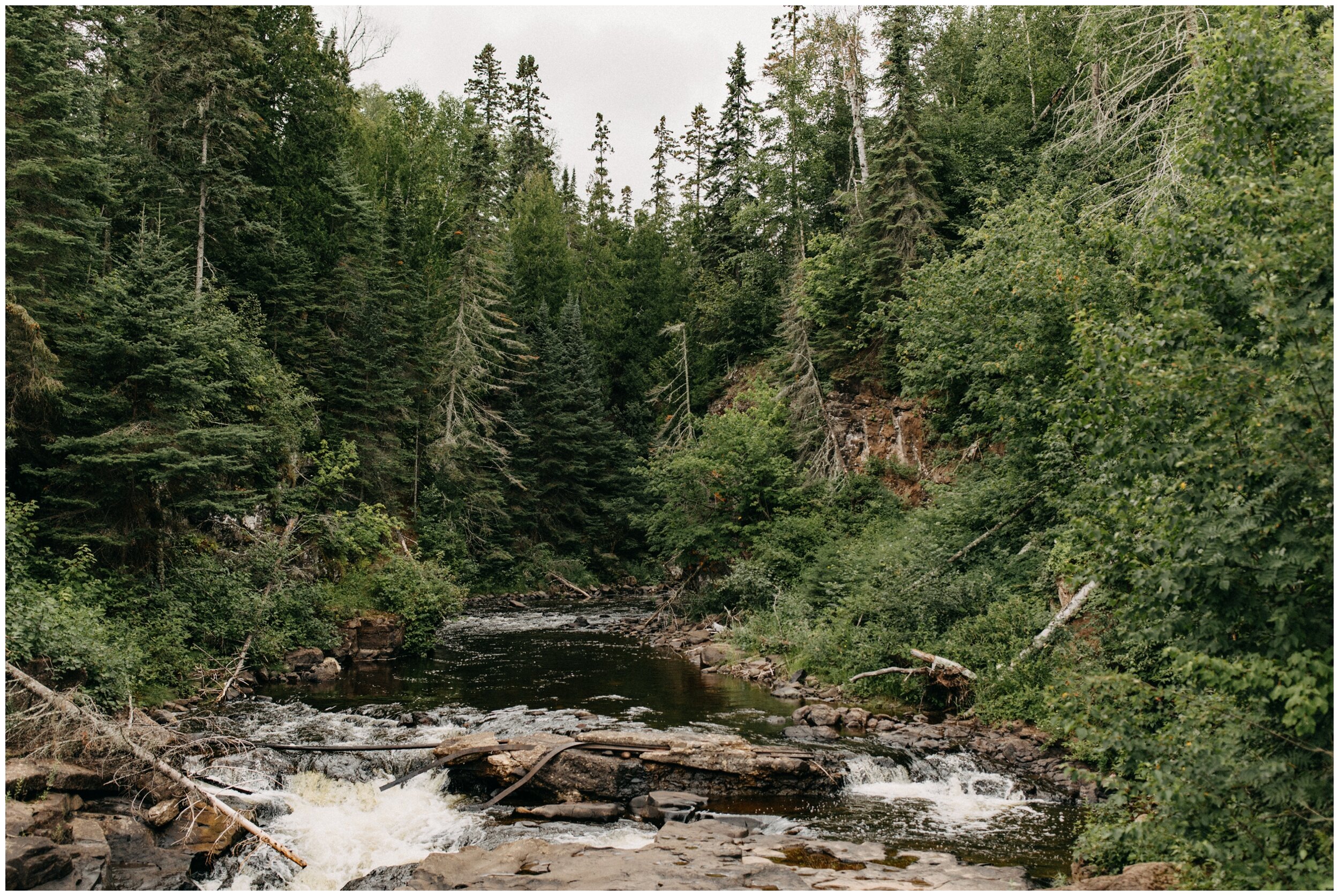 Waterfall and pine trees at Lutsen resort on lake superior