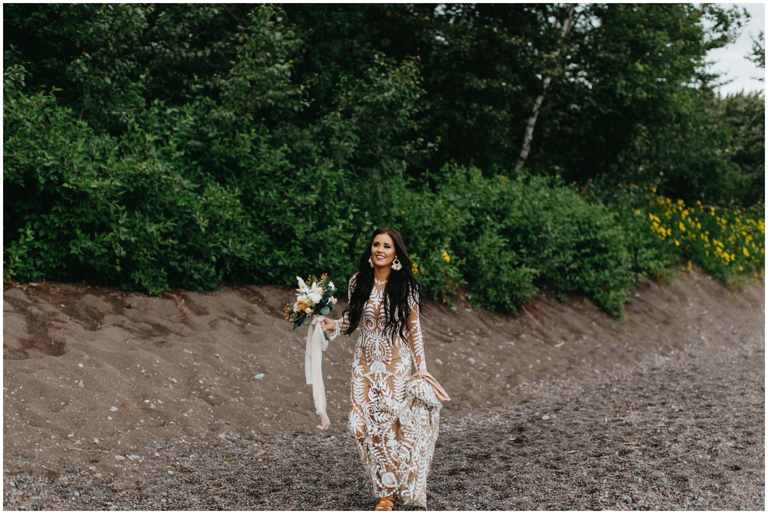 Bride walking to first look with groom at Lutsen resort