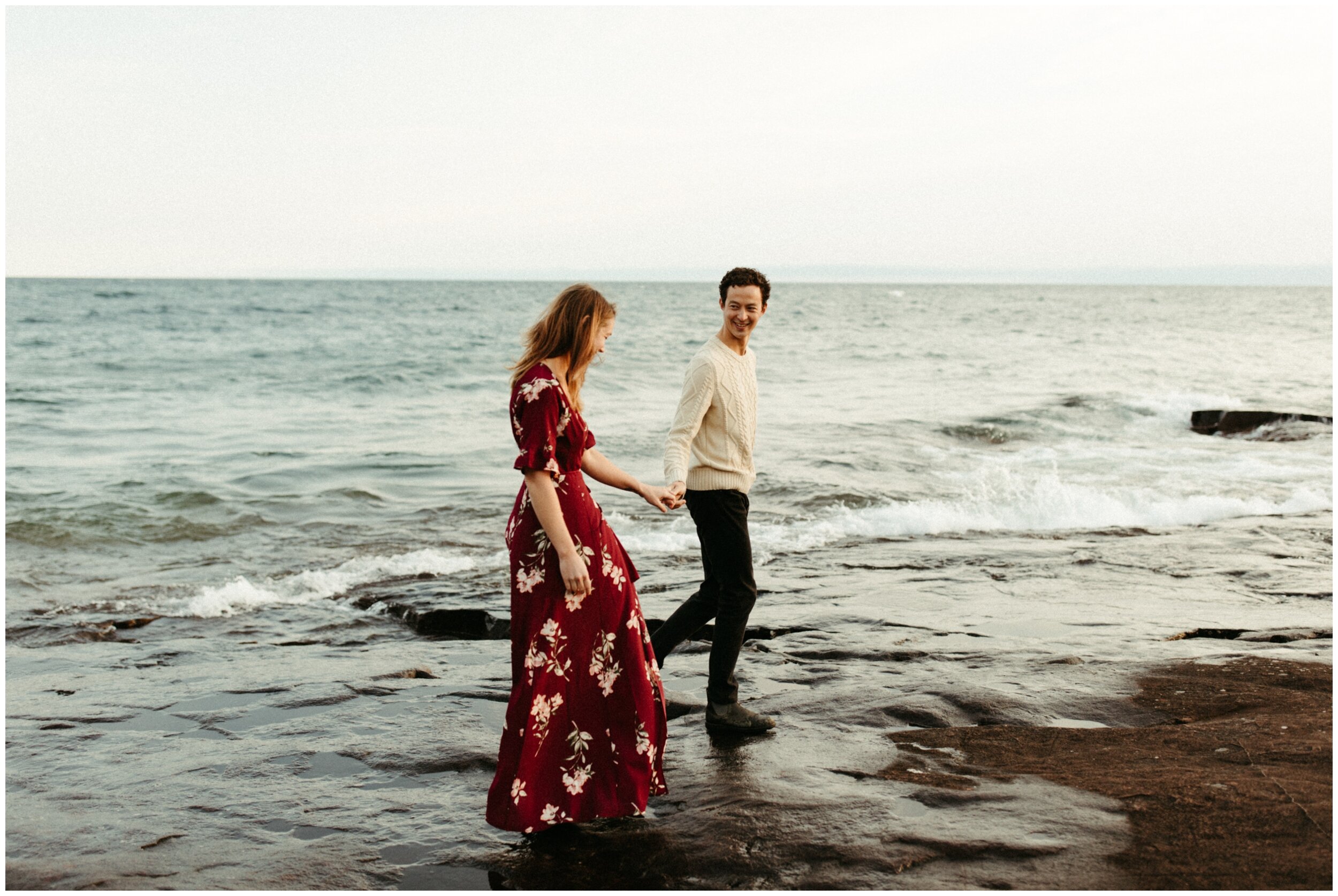 Romantic fall engagement session on the north shore of Lake Superior in Grand Marais Minnesota photographed by Britt DeZeeuw