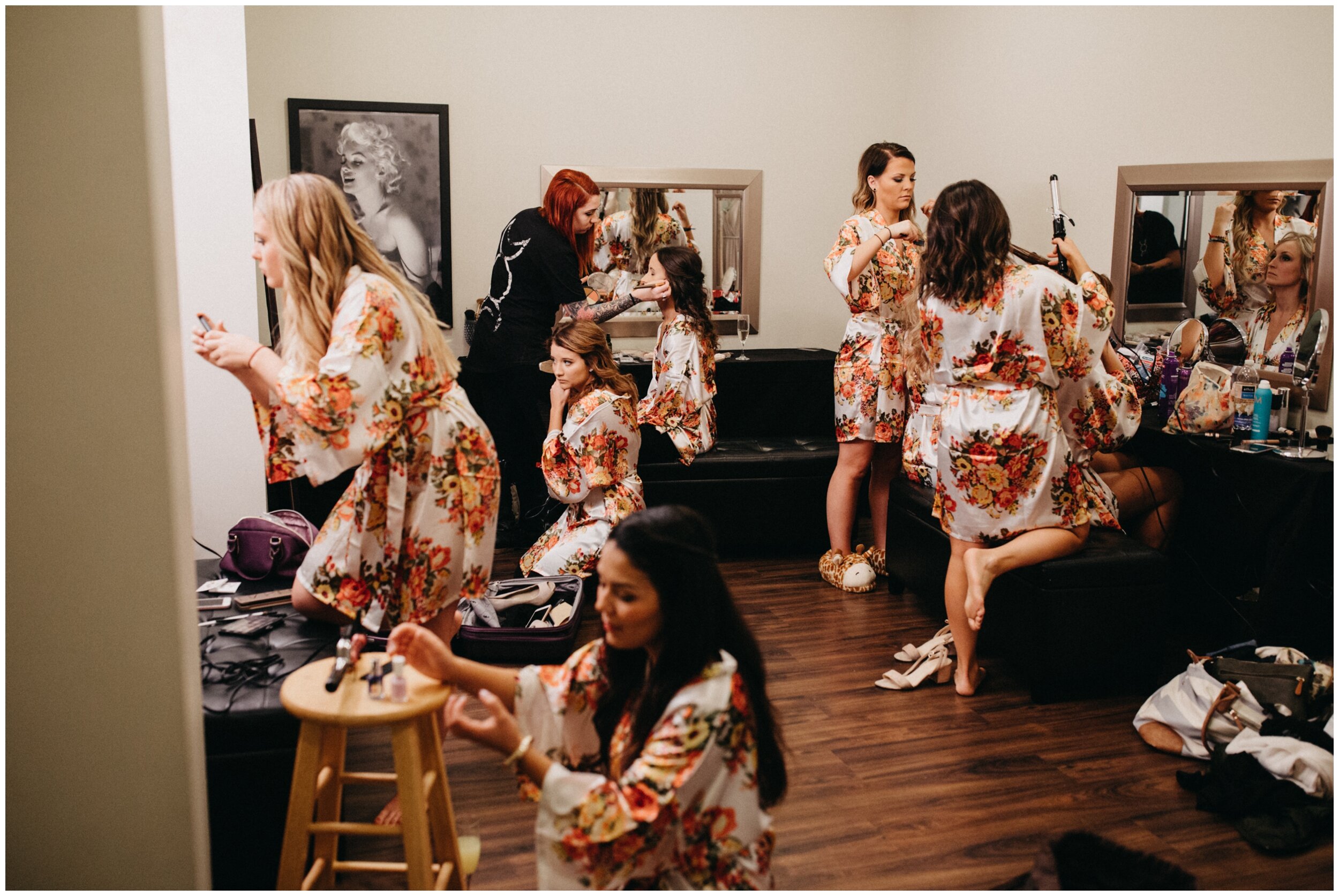 Bridesmaids in floral print robes getting ready at the Greysolon in Duluth