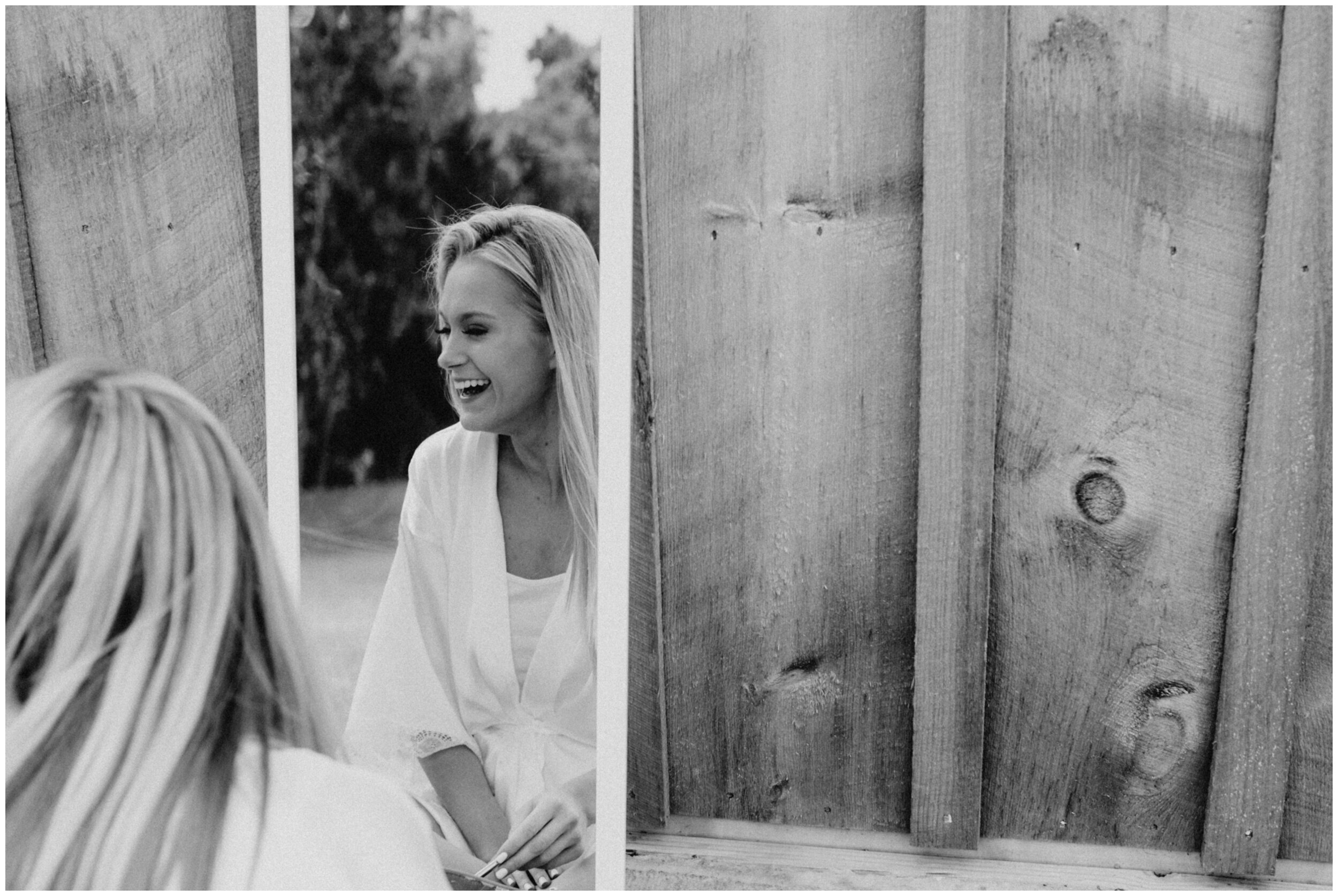 Bride getting ready for wedding day outside the barn at Creekside Farm 