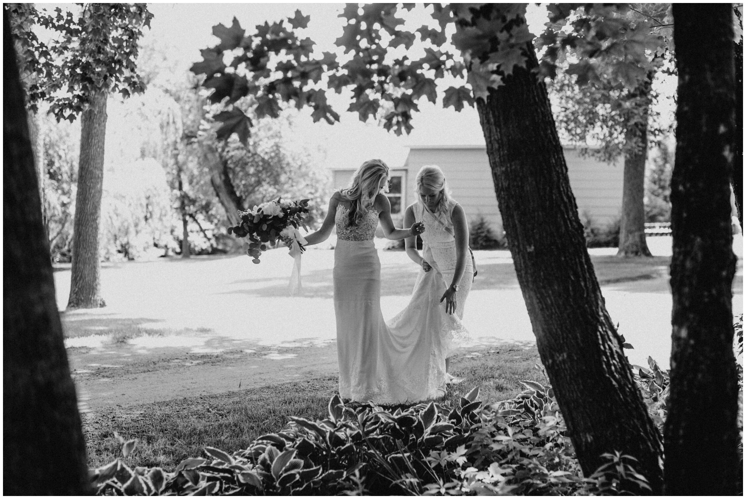 Bride walking to first look with groom at  Minnesota farm wedding venue