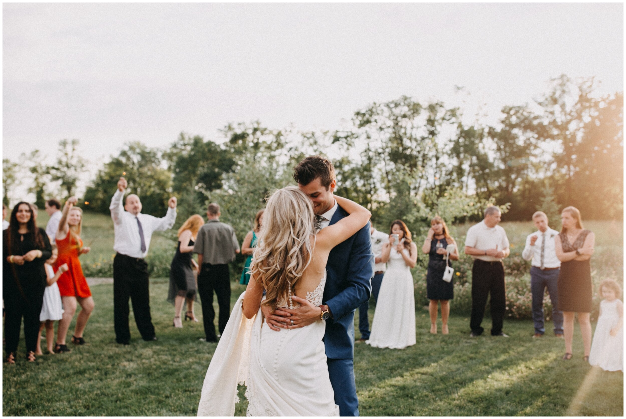 Bride and groom sparkler dance during sunset at Creekside Farm wedding in Rush City Minnesota