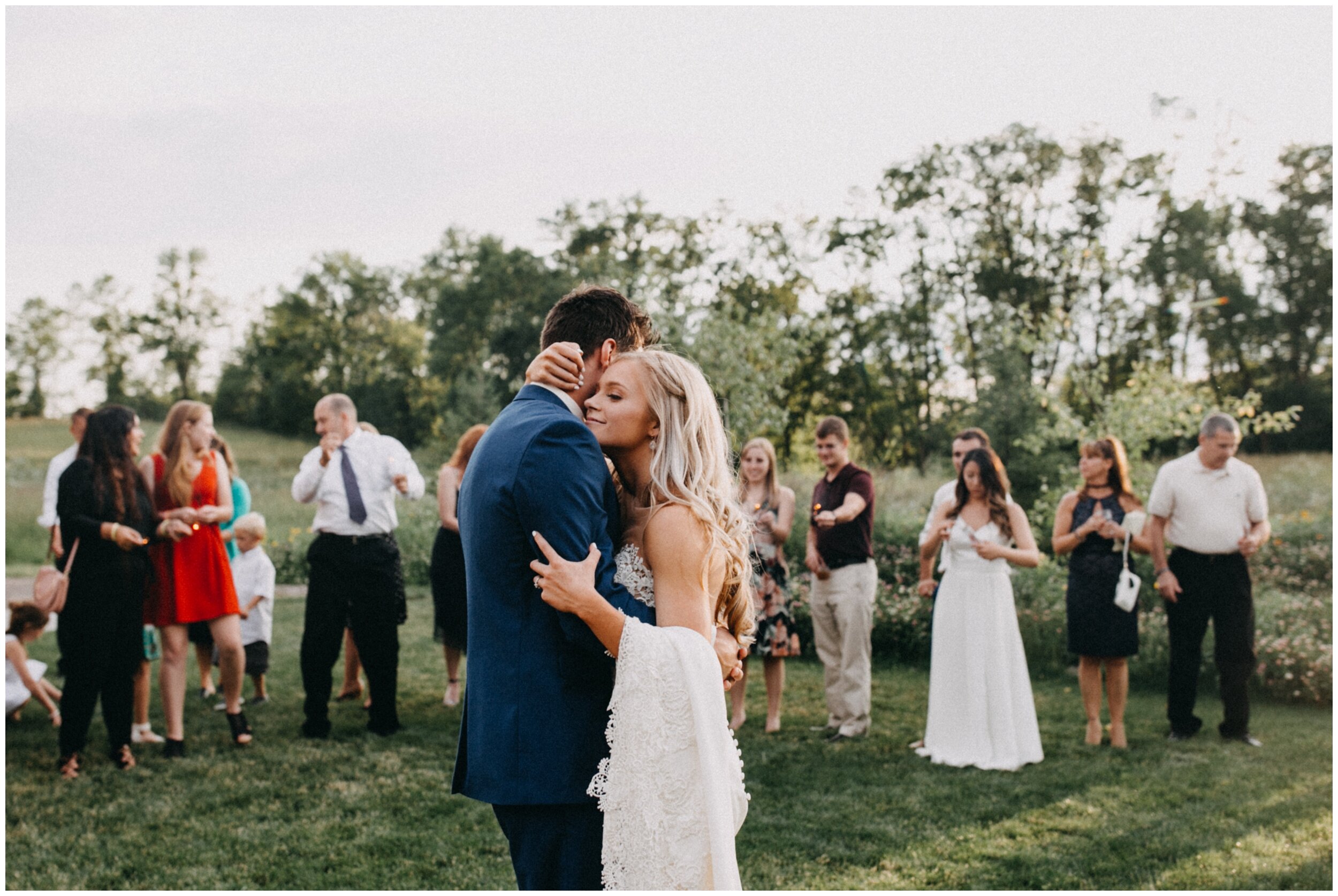 Outdoor dance with sparklers at Minnesota barn wedding