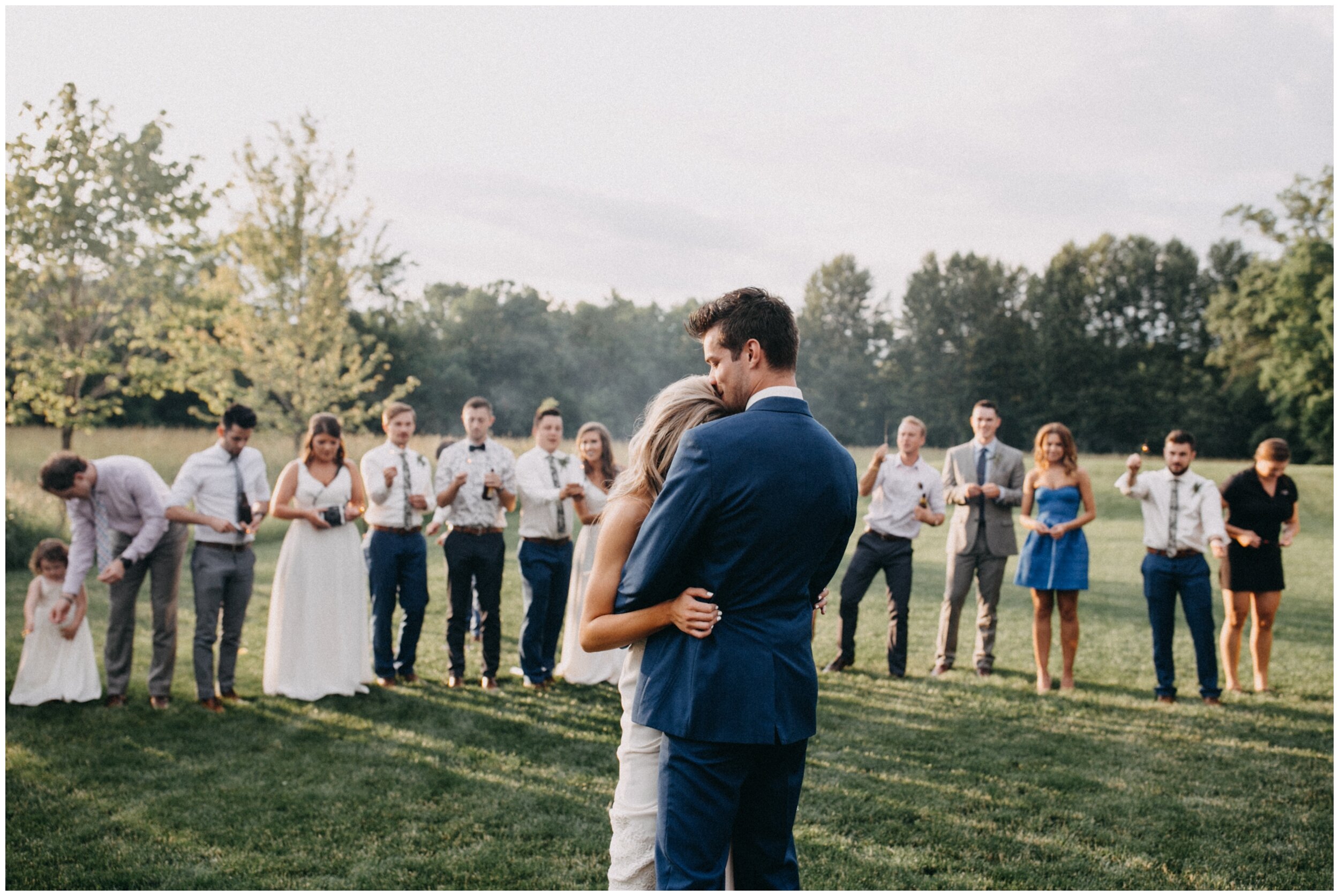 Bride and groom first dance with sparklers during Minnesota barn wedding at Creekside Farm
