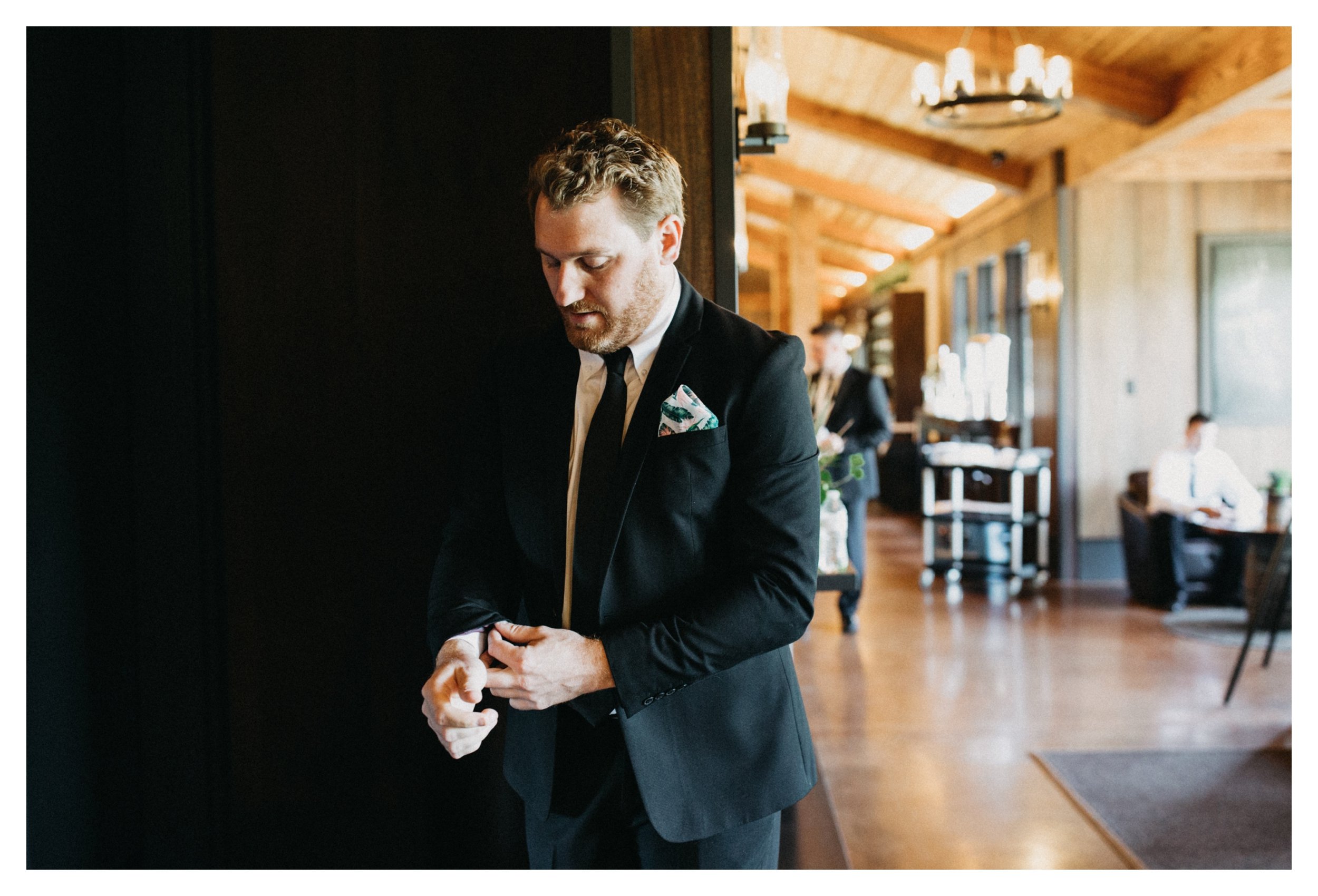 Groom getting ready for vineyard wedding