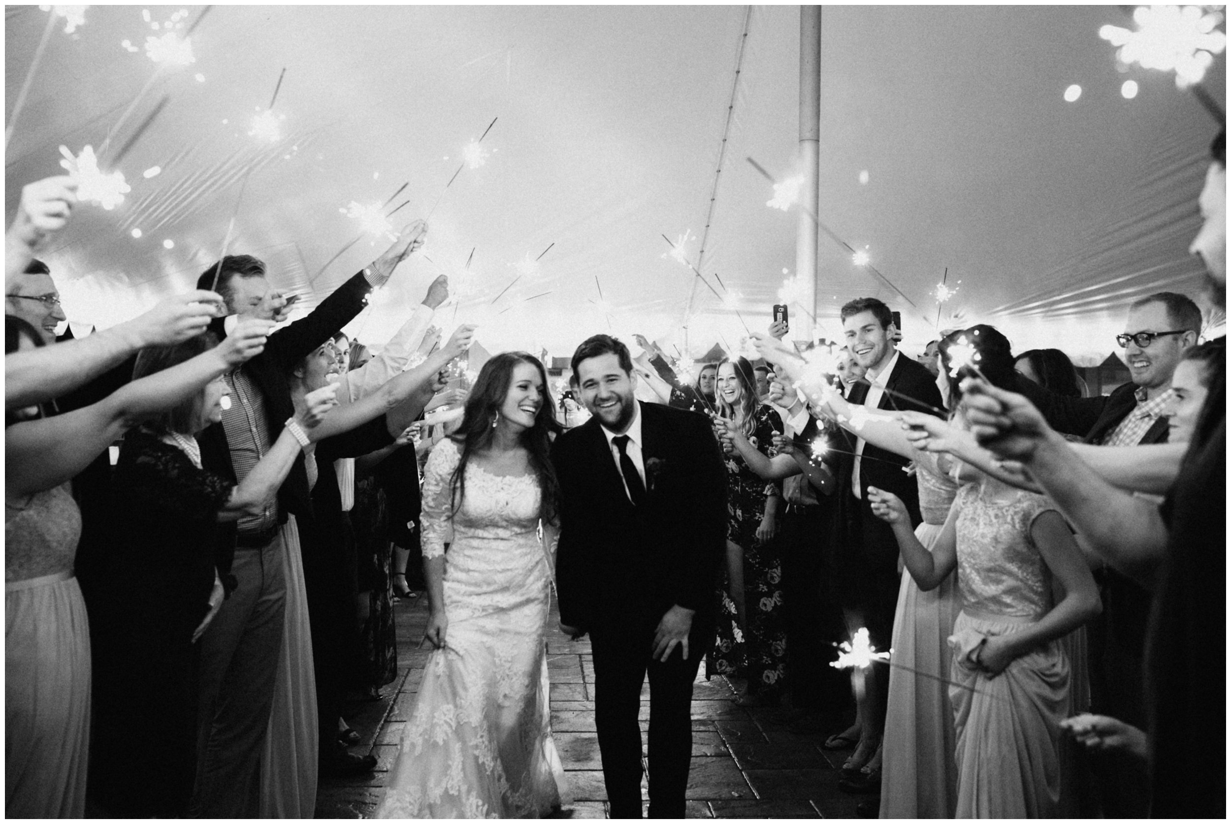 Bride and groom sparkler wedding exit at cabin on Gull Lake in Nisswa, Minnesota