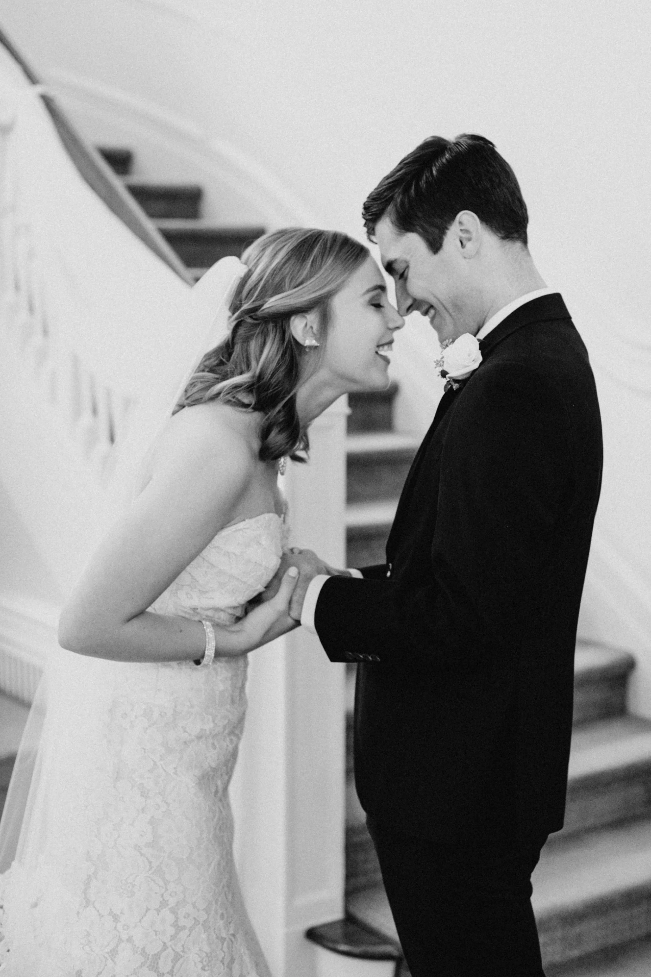 Bride and groom during their first look on their wedding day at the St Paul College Club