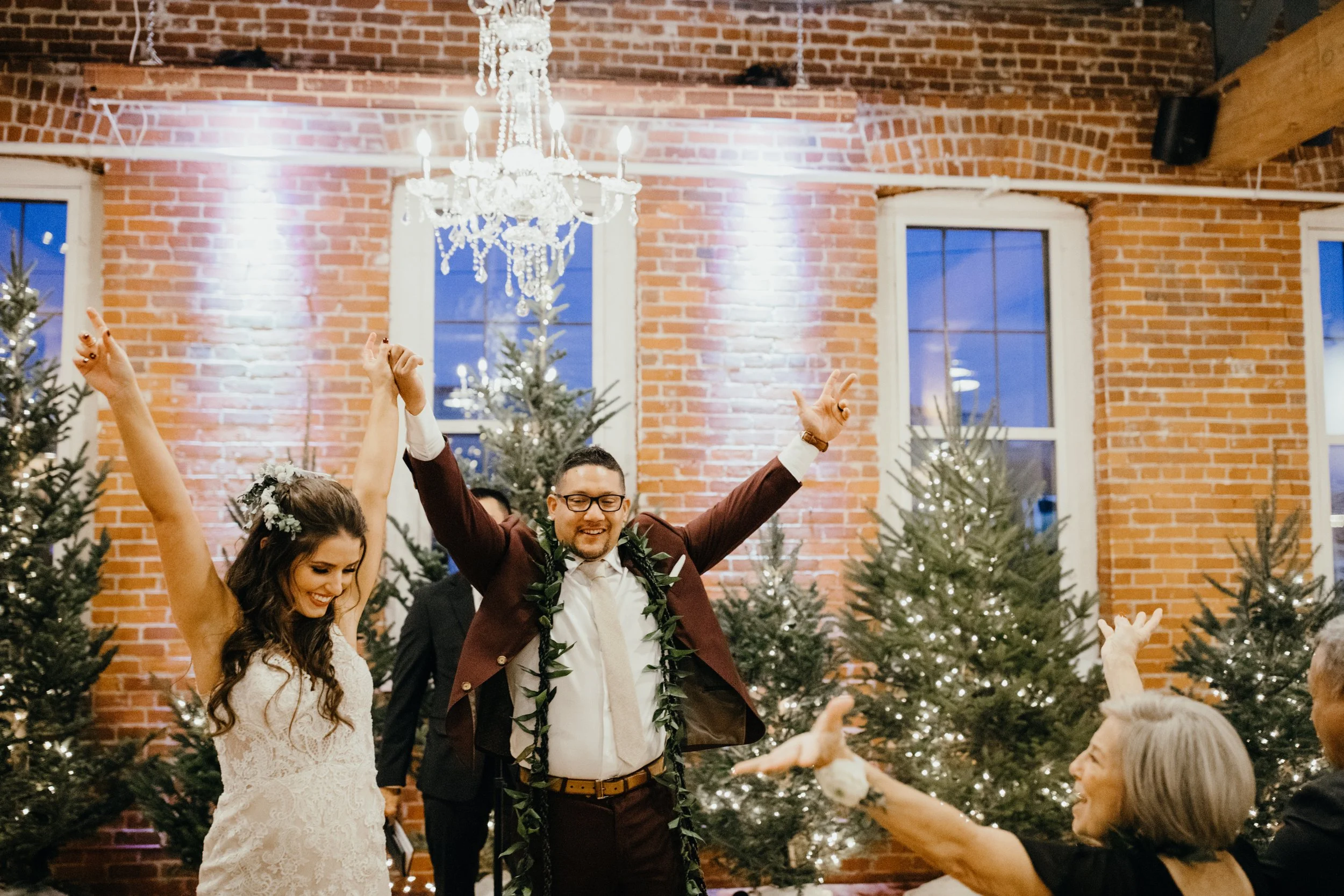 Bride and groom celebrating during industrial wedding at JX venue in Stillwater, MN