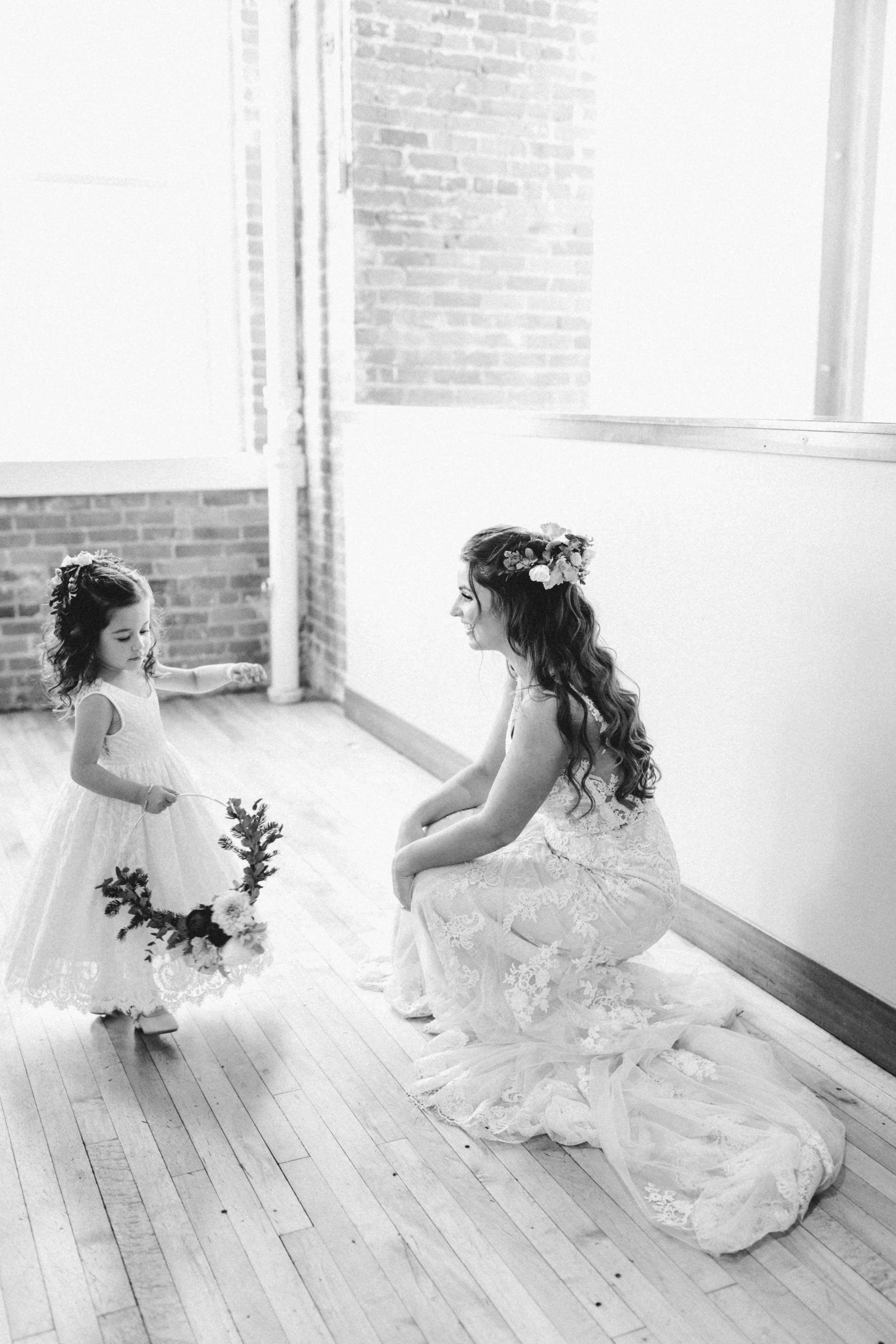 Bride and flower girl at JX venue in Stillwater, Minnesota