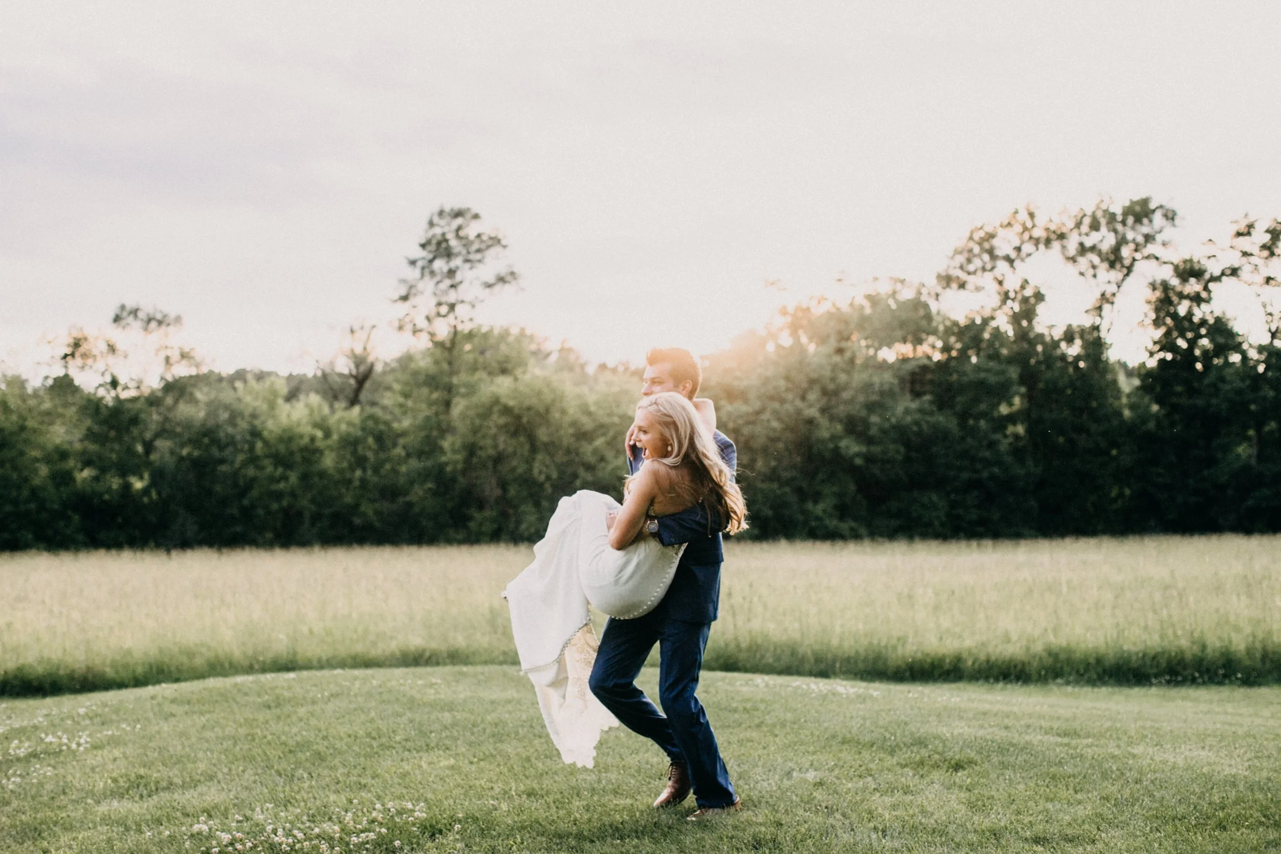 Bride and groom during sunset at Creekside Farm wedding in Minnesota