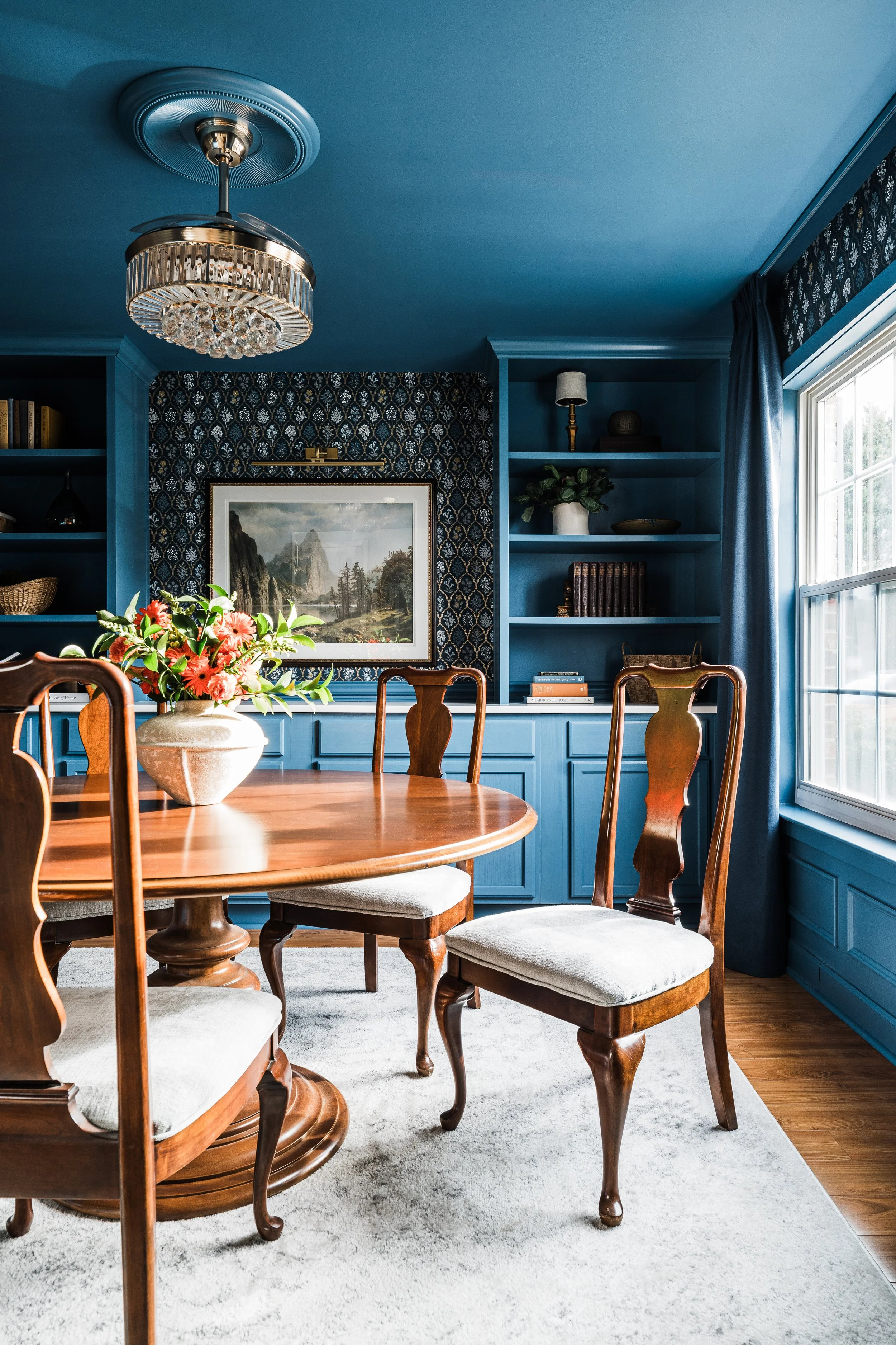 Moody-dining-room-with-round-table.jpg