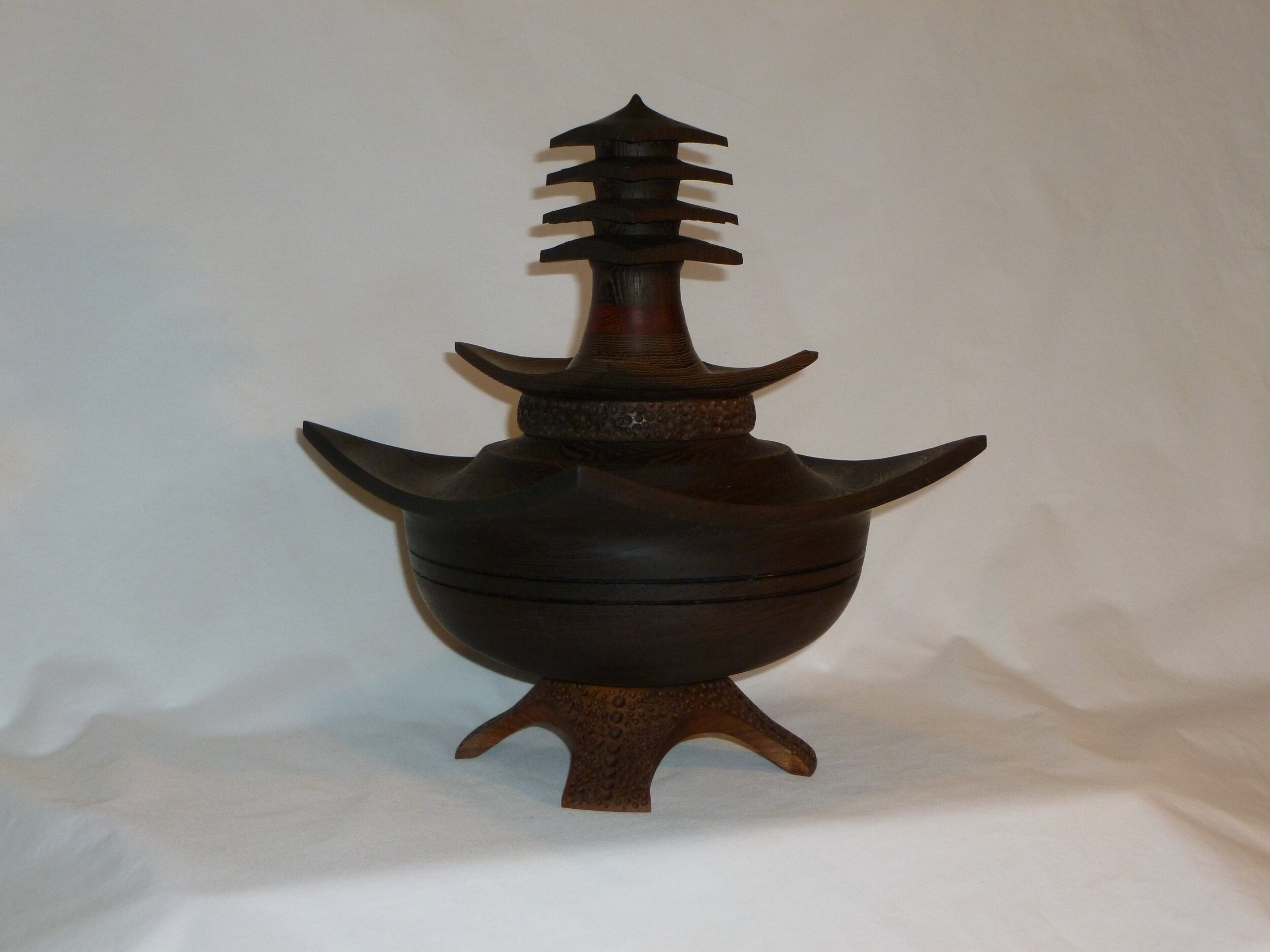 "Pagoda Exotique"
Wenge, Paduak, American Walnut.
220 x 220 x 300.
This piece was turned in Canada whilst on teaching exchange using some of the exotic timbers from the Americas.