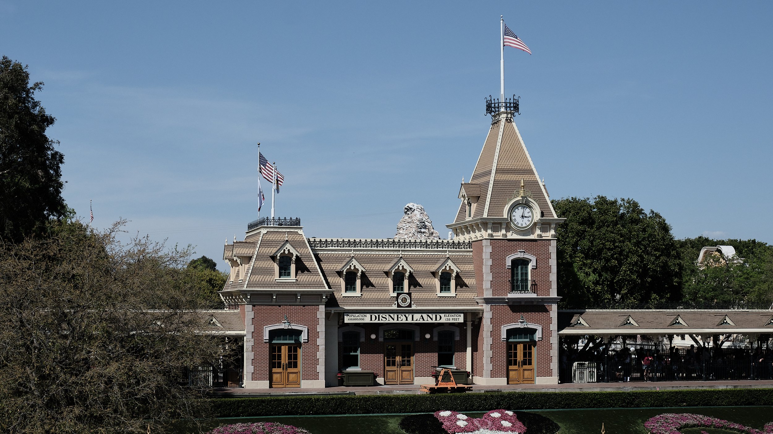 Disneyland || Main Street Station and Matterhorn || 1955 (view from passing monorail train)