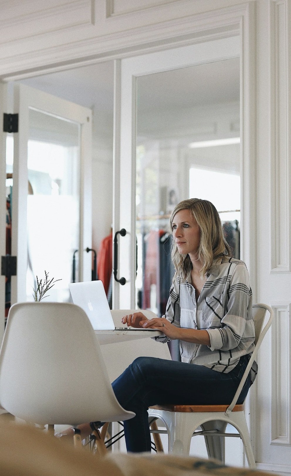 Woman typing at table