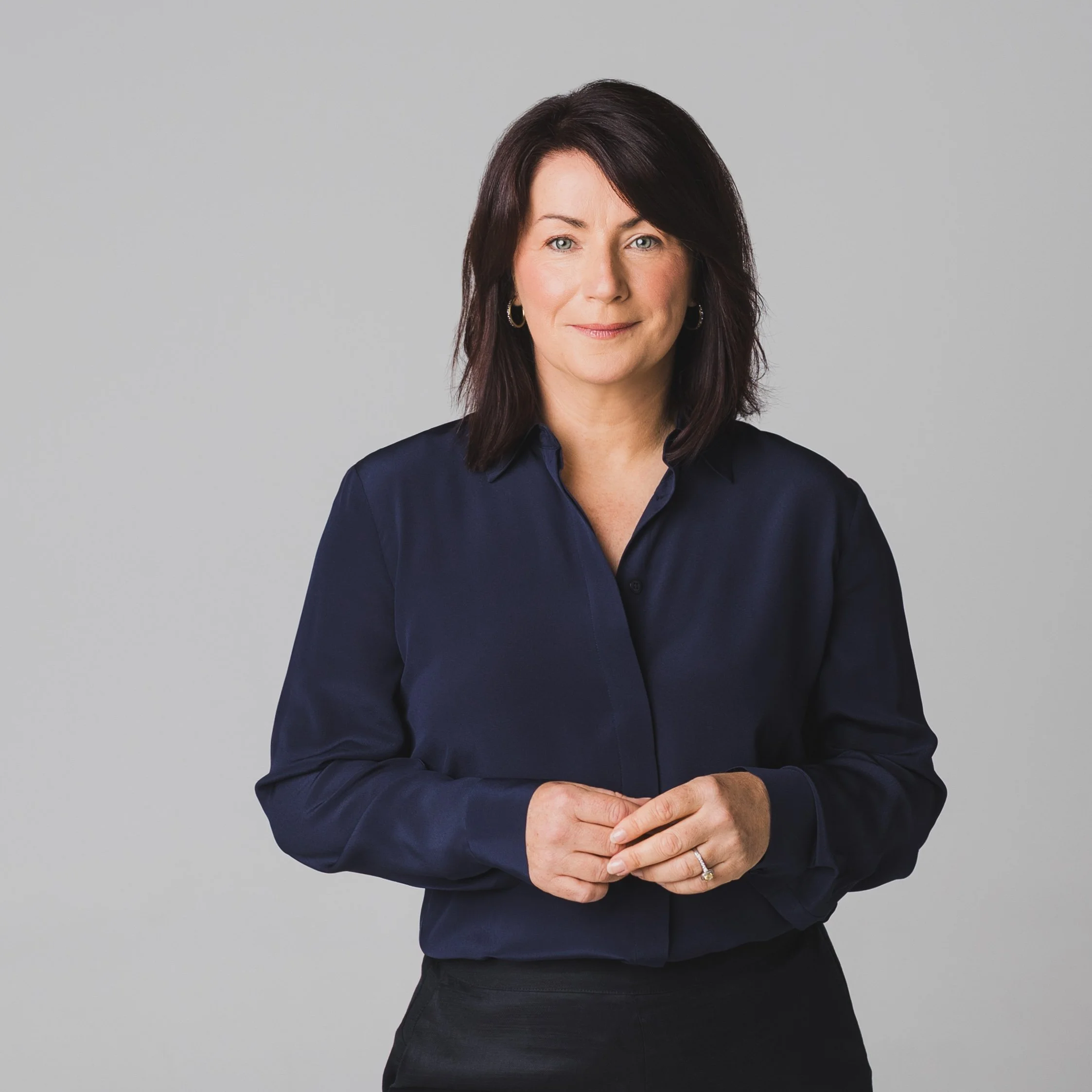 Andrea Ryan wearing a blue shirt