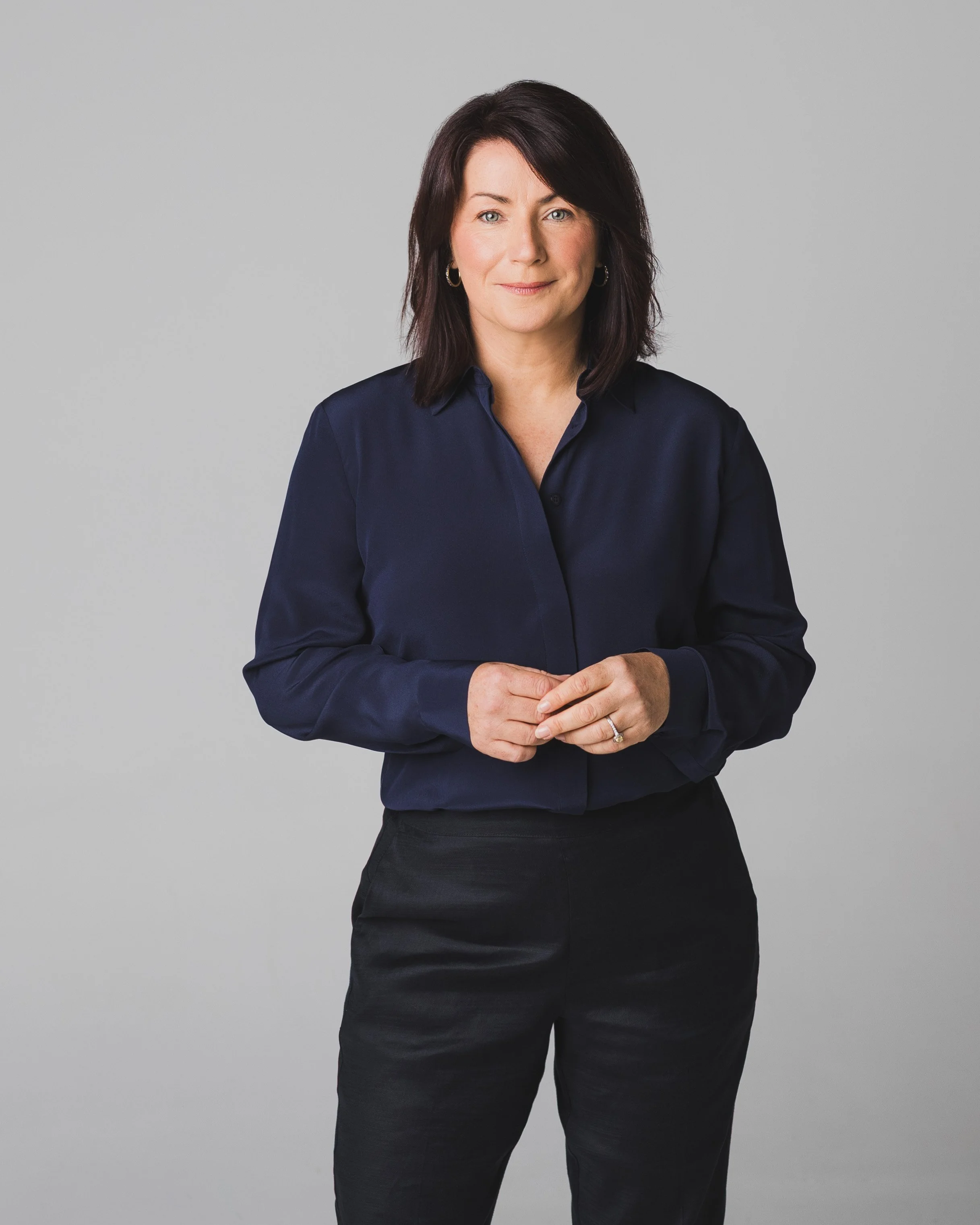 Andrea Ryan wearing a blue shirt