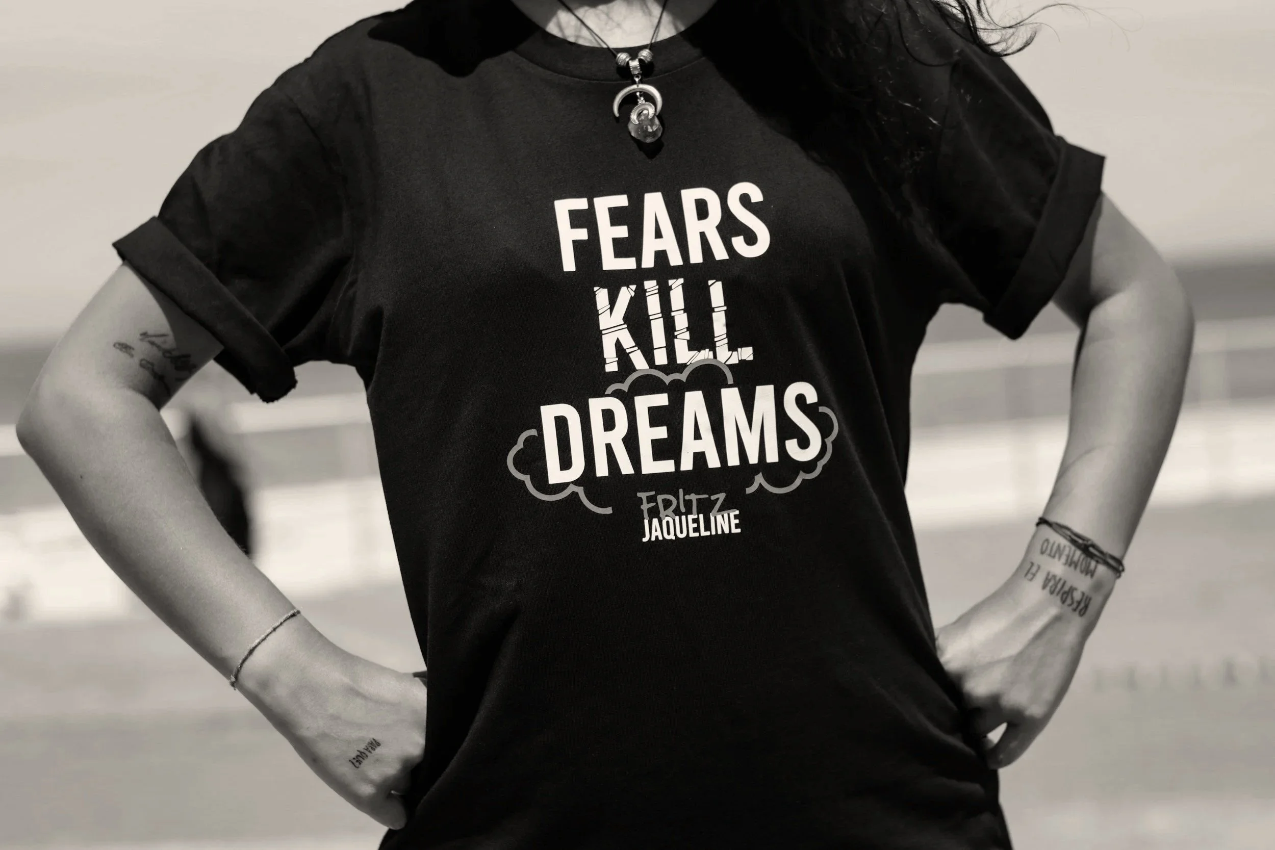 Girl wearing Fear Kills Dreams tshirt
