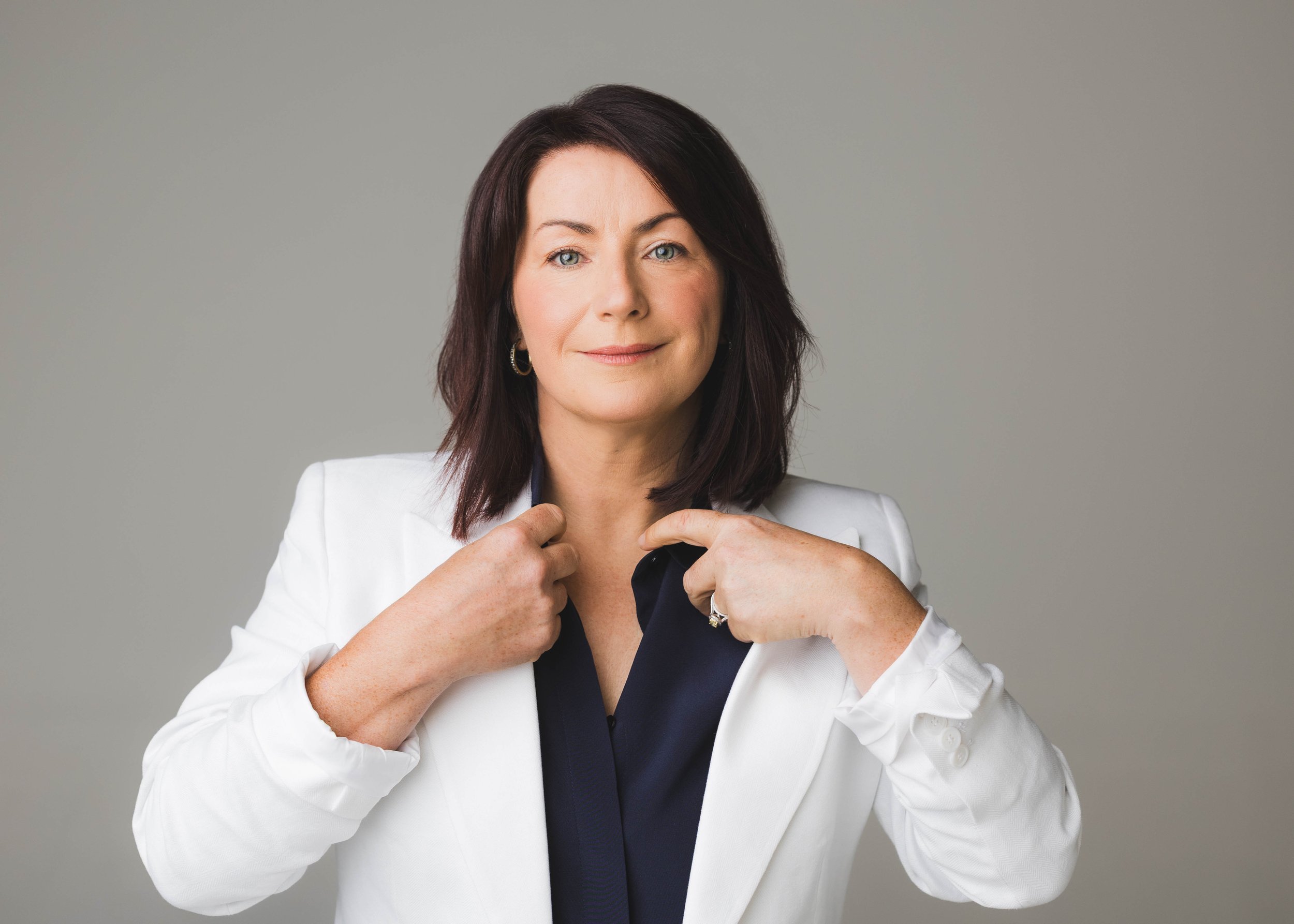 Andrea Ryan adjusting collar