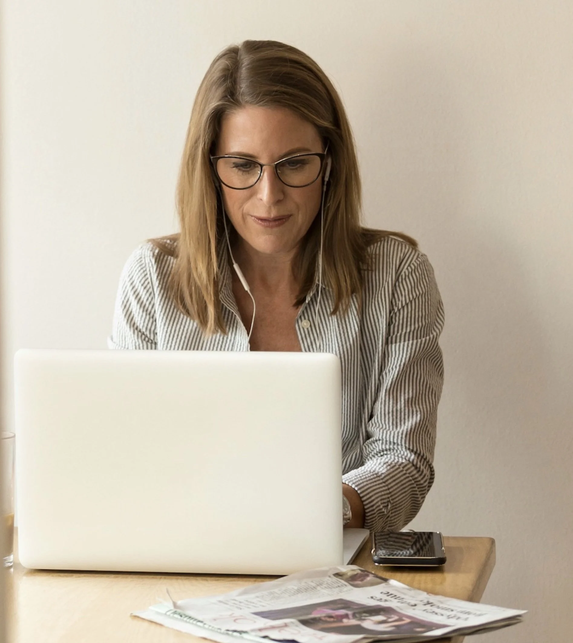 Lady working typing on laptop