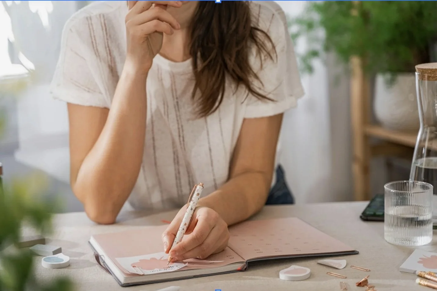 Lady writing in journal