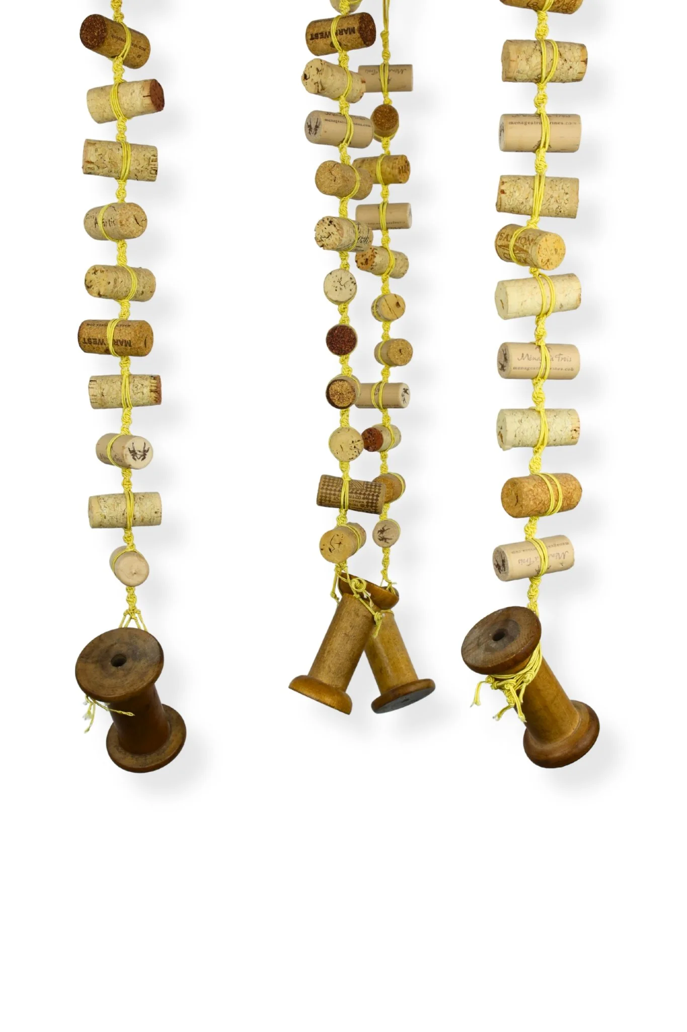 Cork and Wooden Spools, yellow cotton cord, cork, and wood spools, 36 x 14 x 14, 2019