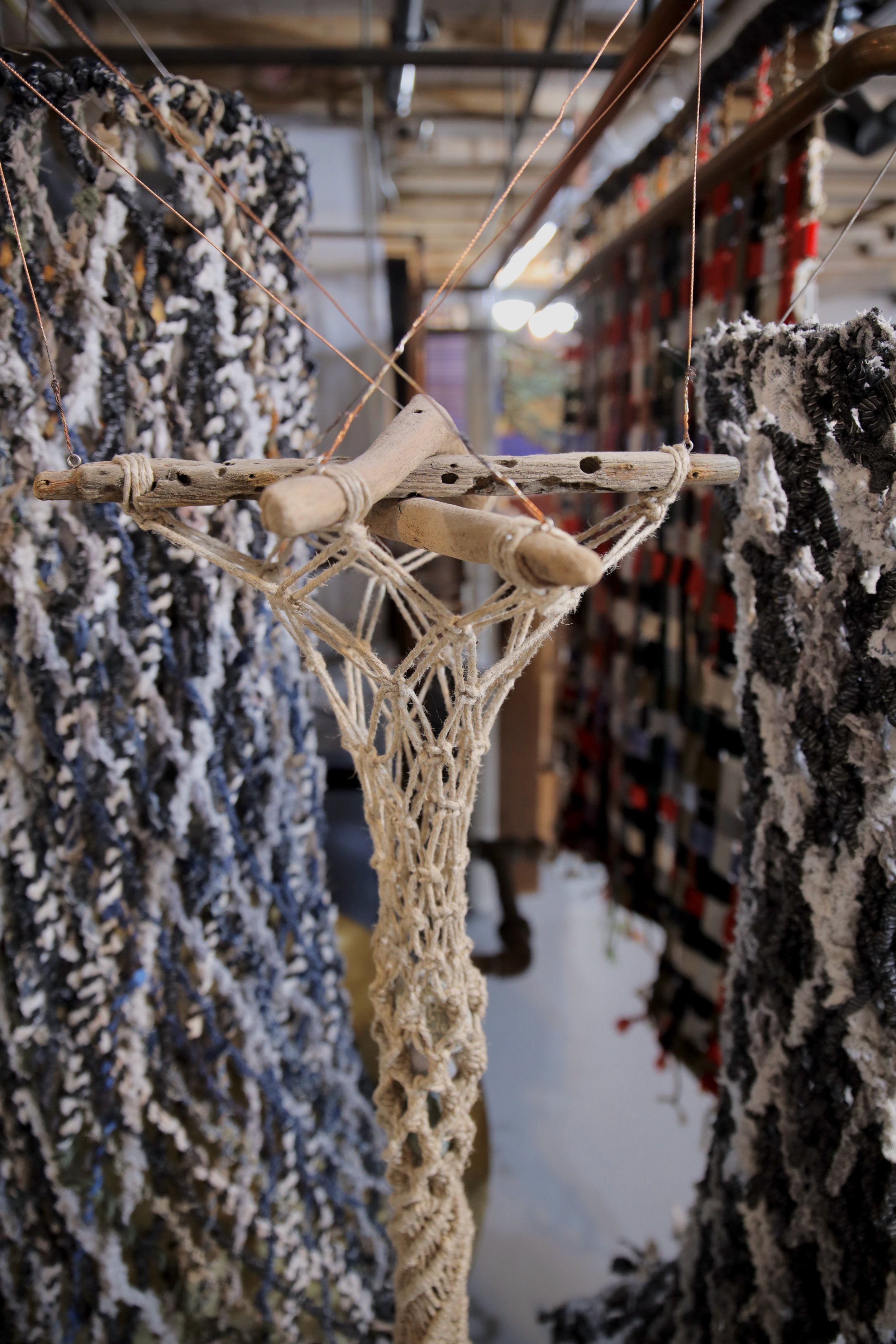 Cylindrical Net, 2017, 36. x 8, Jute String with Various Knots and Rocks.