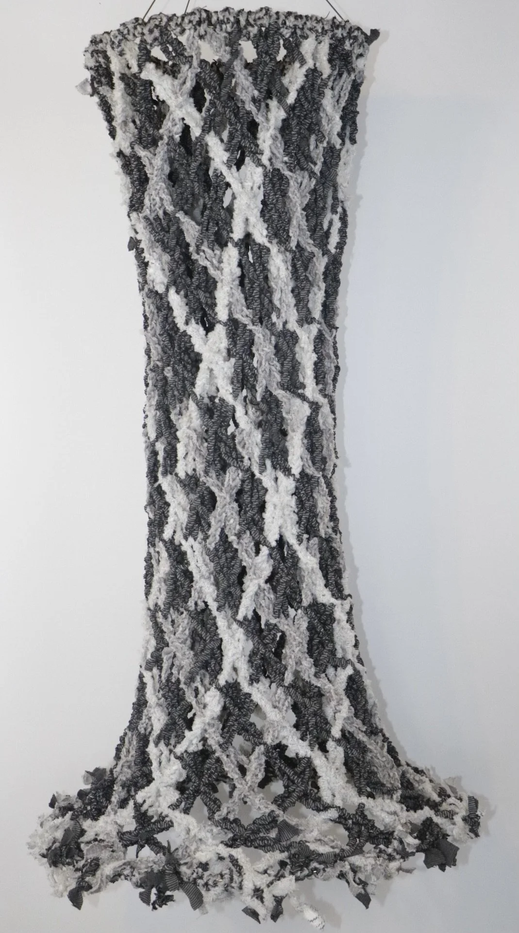 Woven Circular Net, 2023, 48” x 25”, Mattress Fabric.